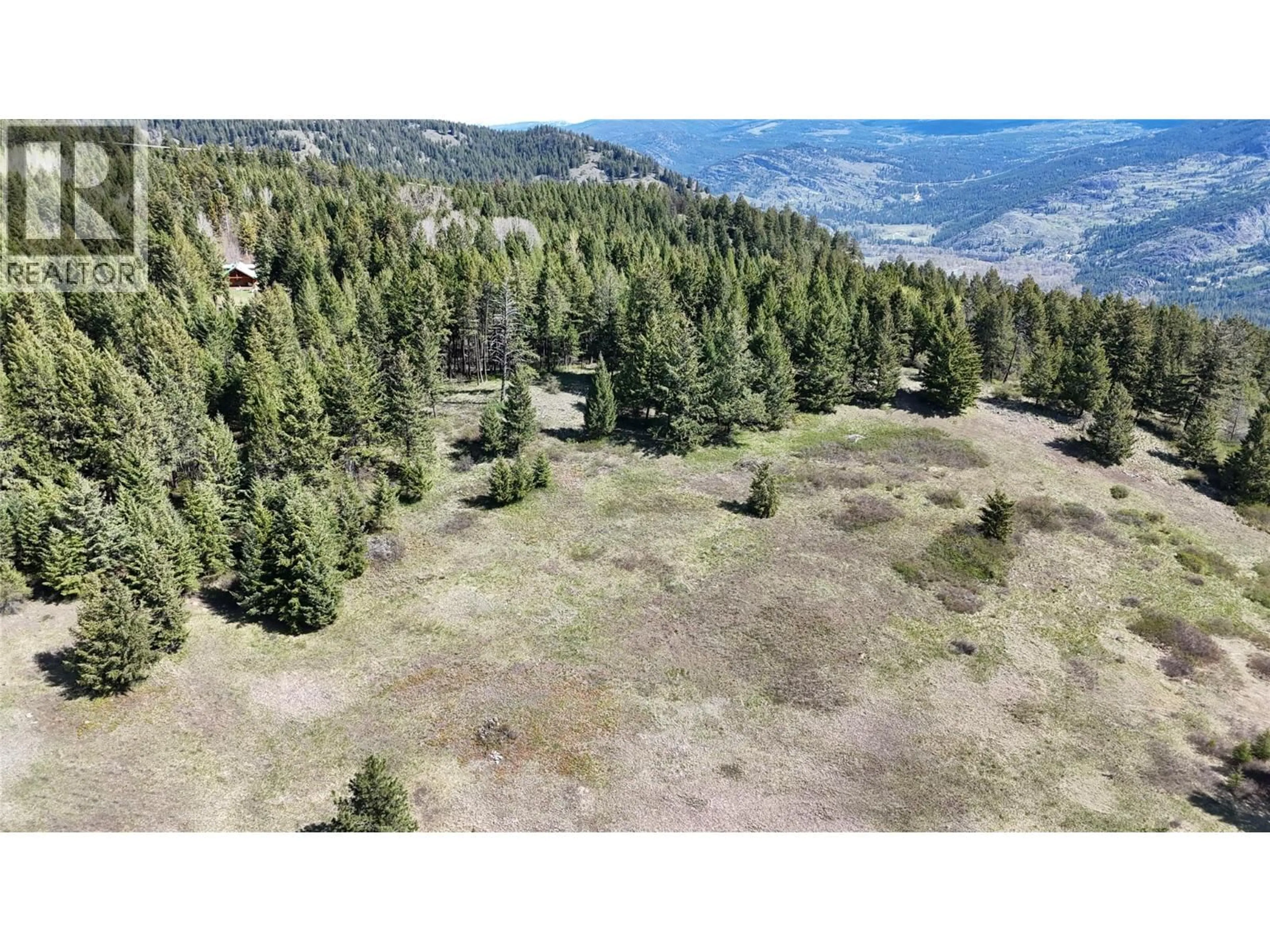 A pic from outside/outdoor area/front of a property/back of a property/a pic from drone, forest/trees view for 5200 HARDY MOUNTAIN ROAD, Grand Forks British Columbia V0H1H2