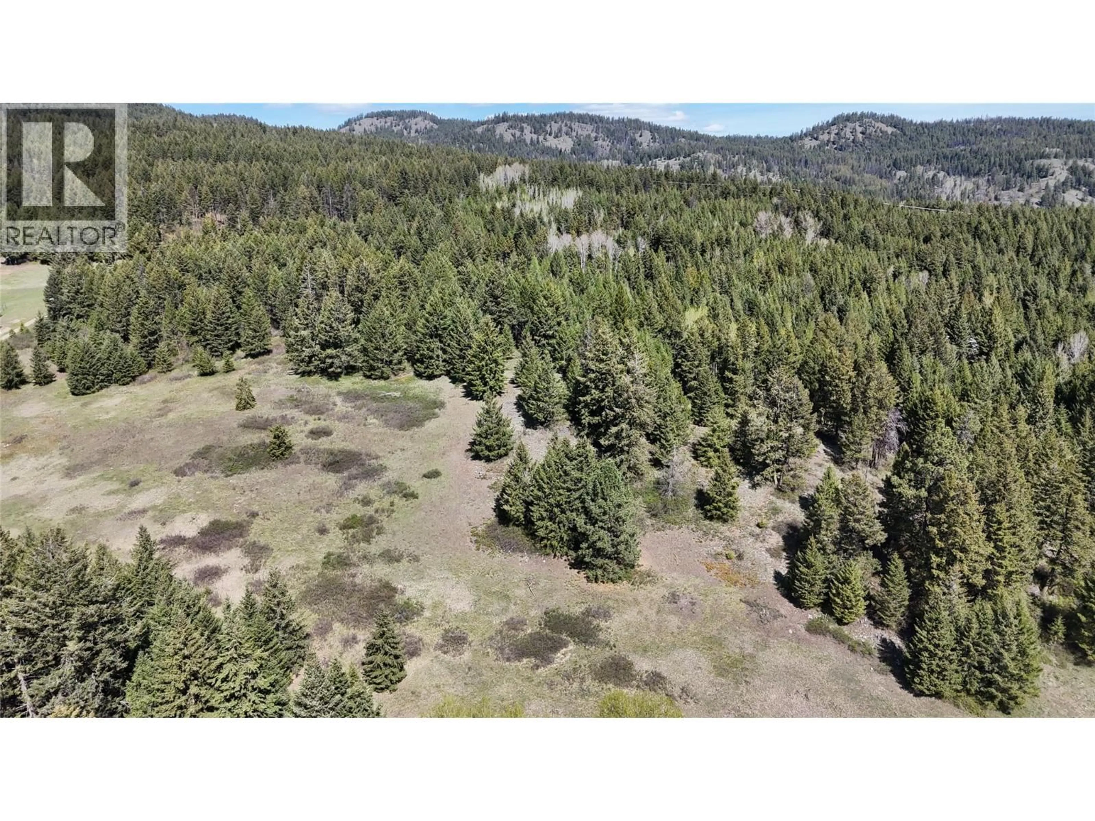 A pic from outside/outdoor area/front of a property/back of a property/a pic from drone, forest/trees view for 5200 HARDY MOUNTAIN ROAD, Grand Forks British Columbia V0H1H2