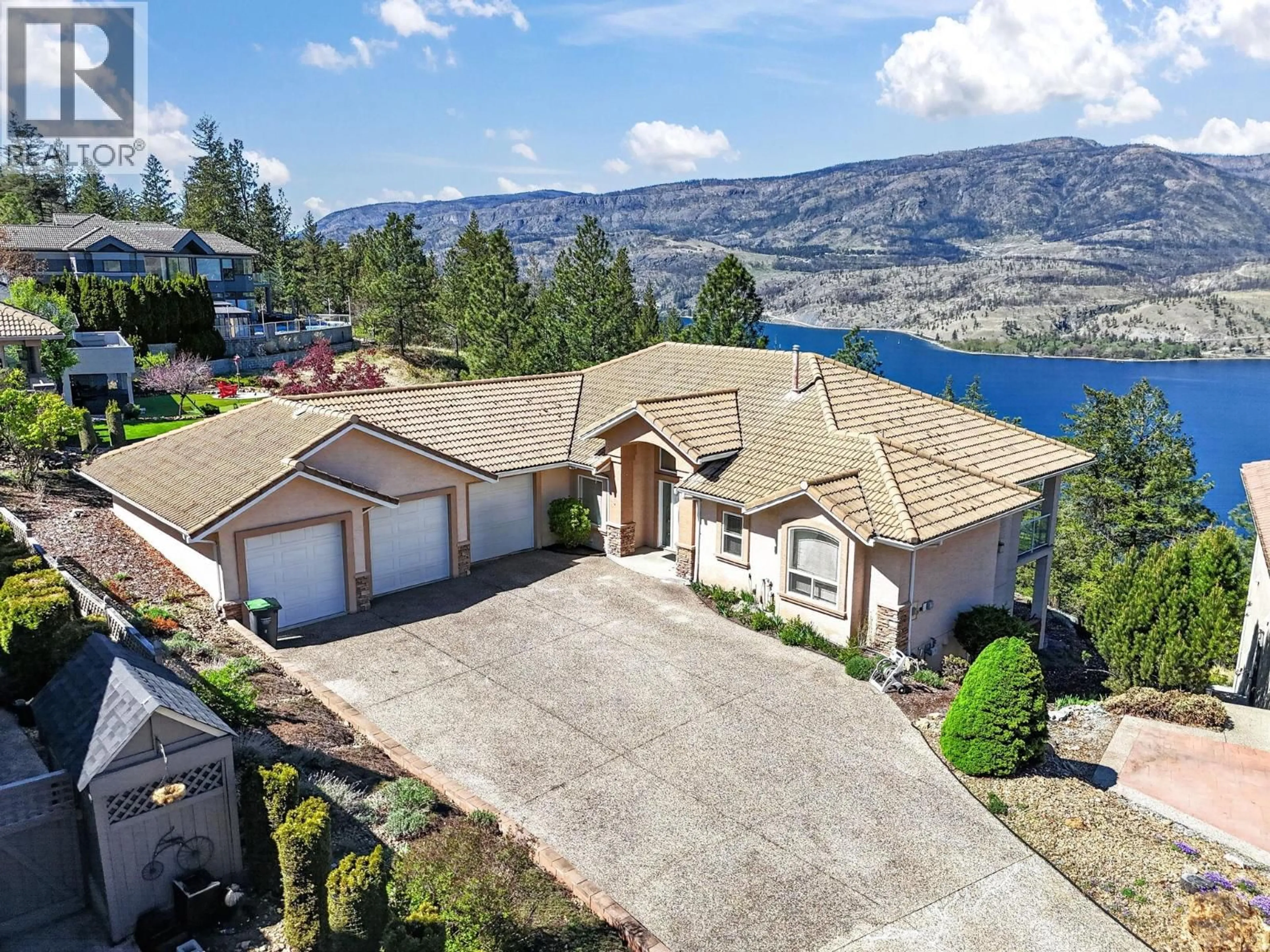 A pic from outside/outdoor area/front of a property/back of a property/a pic from drone, water/lake/river/ocean view for 248 PENDRAGON PLACE, Kelowna British Columbia V1V1N2