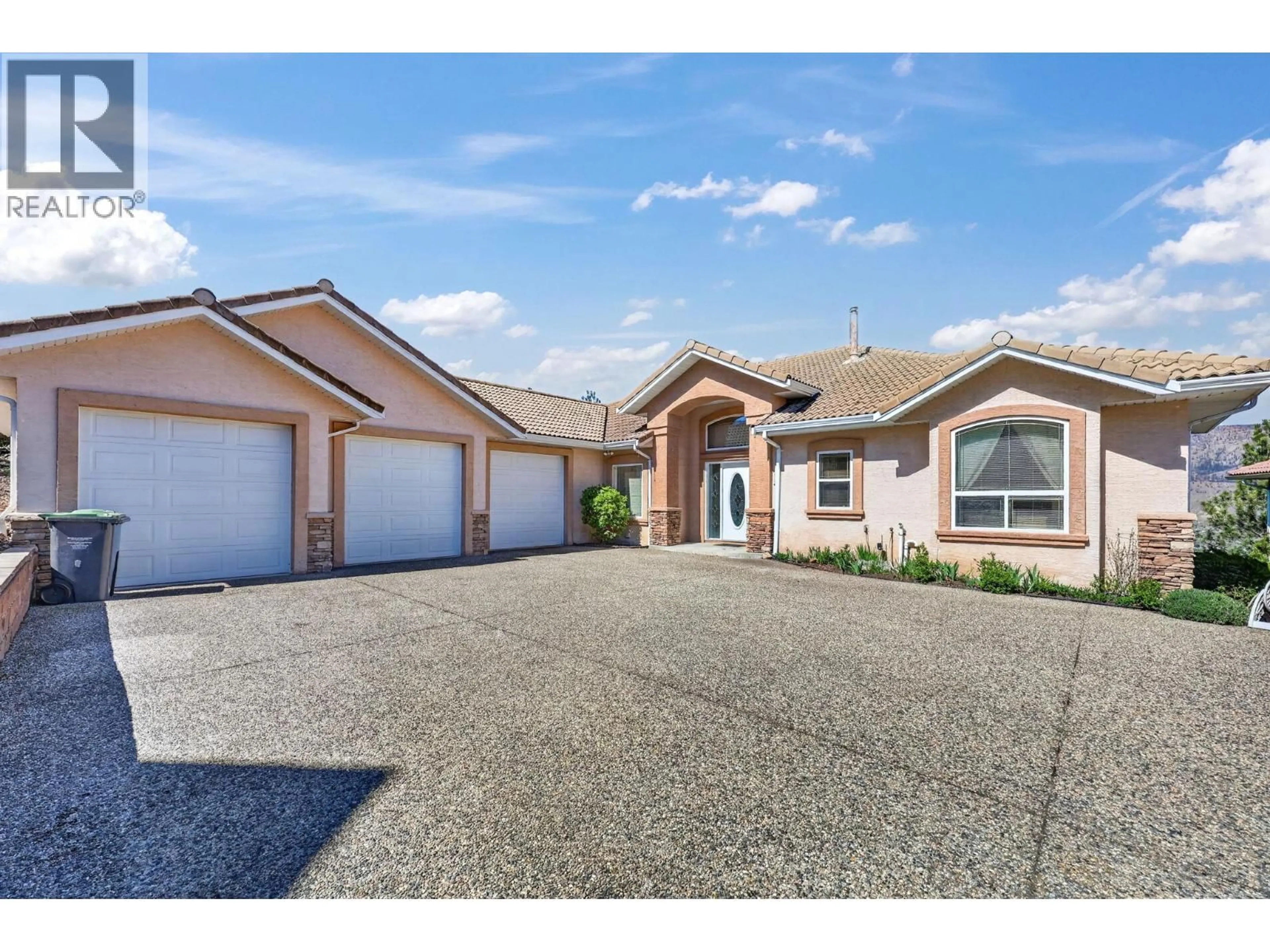 A pic from outside/outdoor area/front of a property/back of a property/a pic from drone, street for 248 PENDRAGON PLACE, Kelowna British Columbia V1V1N2