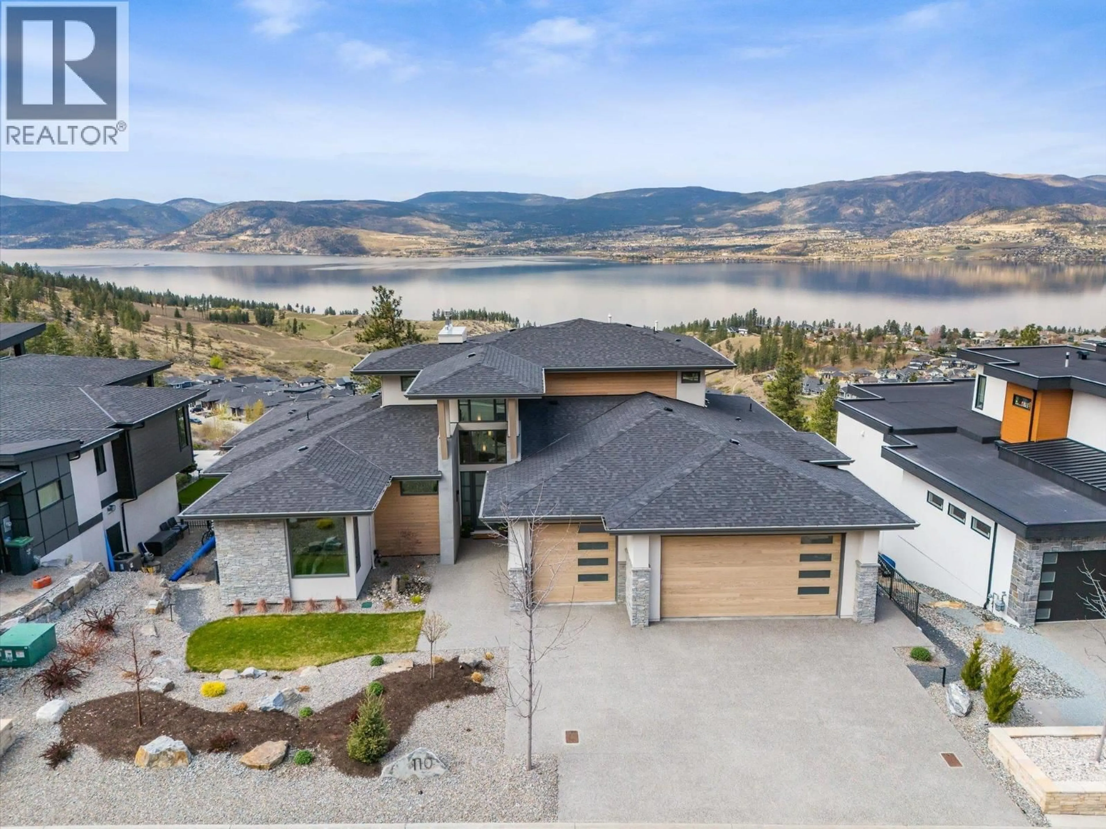 A pic from outside/outdoor area/front of a property/back of a property/a pic from drone, water/lake/river/ocean view for 110 - 5650 THE EDGE PLACE, Kelowna British Columbia V1W5M4