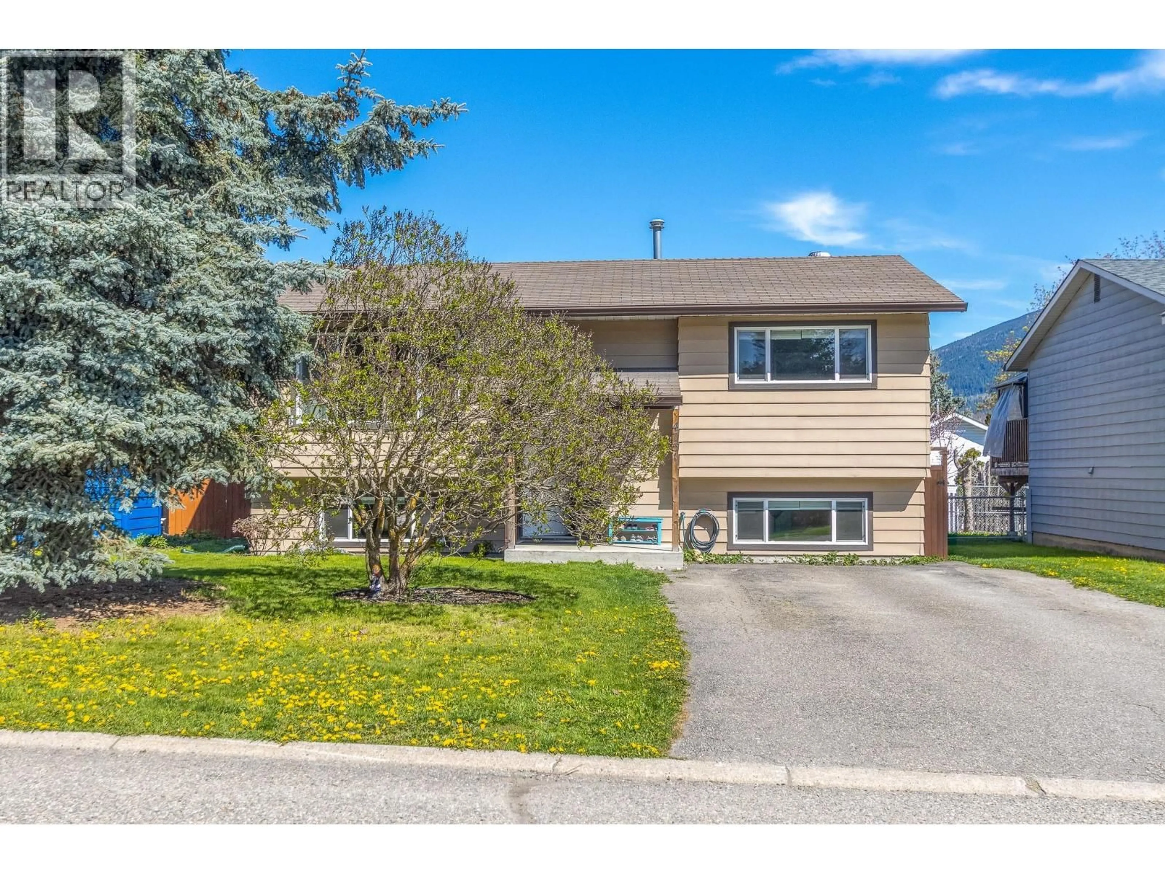 Home with vinyl exterior material, street for 4751 71 AVENUE NORTHEAST, Salmon Arm British Columbia V0E1K0