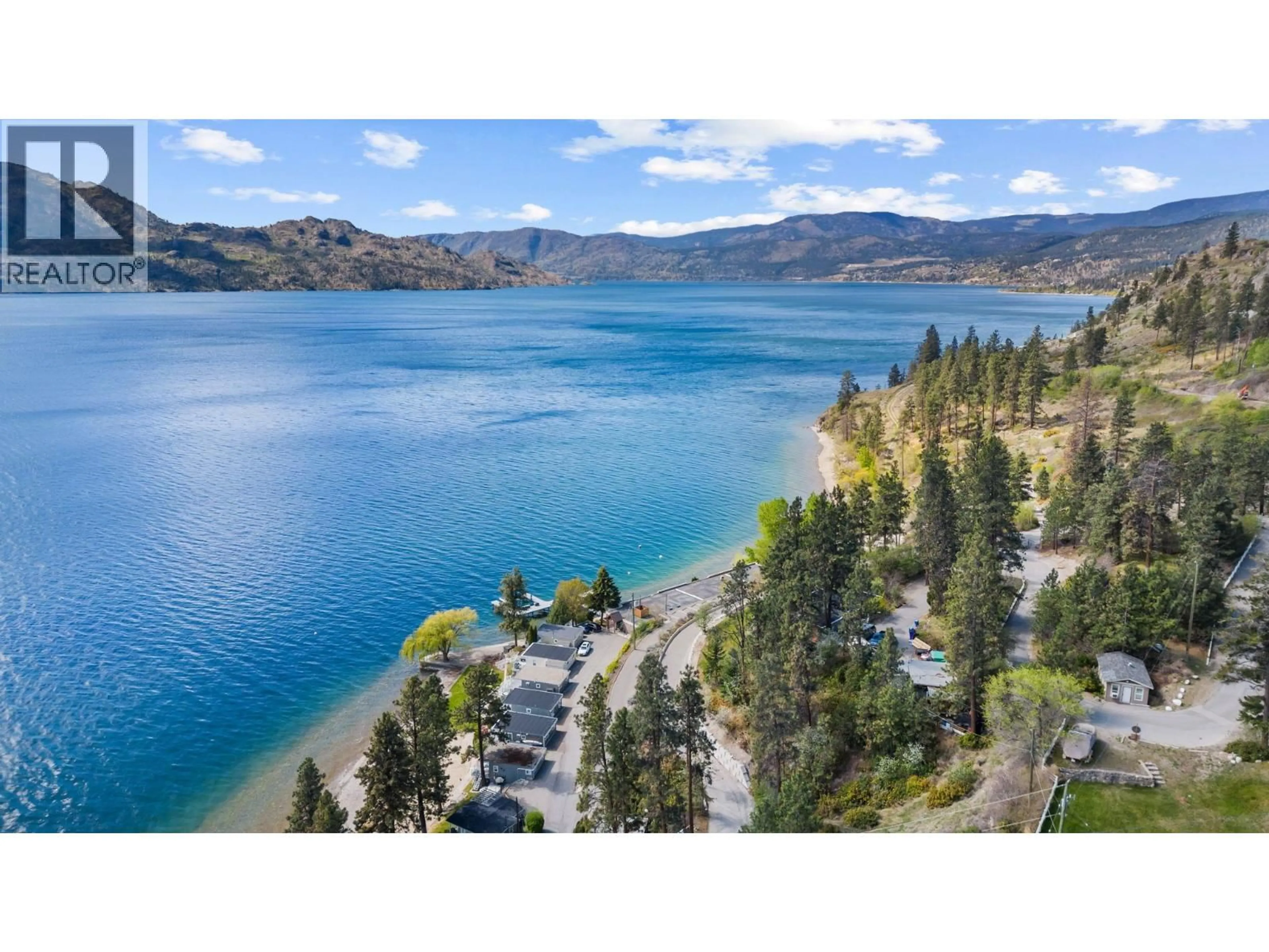 A pic from outside/outdoor area/front of a property/back of a property/a pic from drone, water/lake/river/ocean view for 100 - 3050 SECLUSION BAY ROAD, Westbank British Columbia V0H2A0