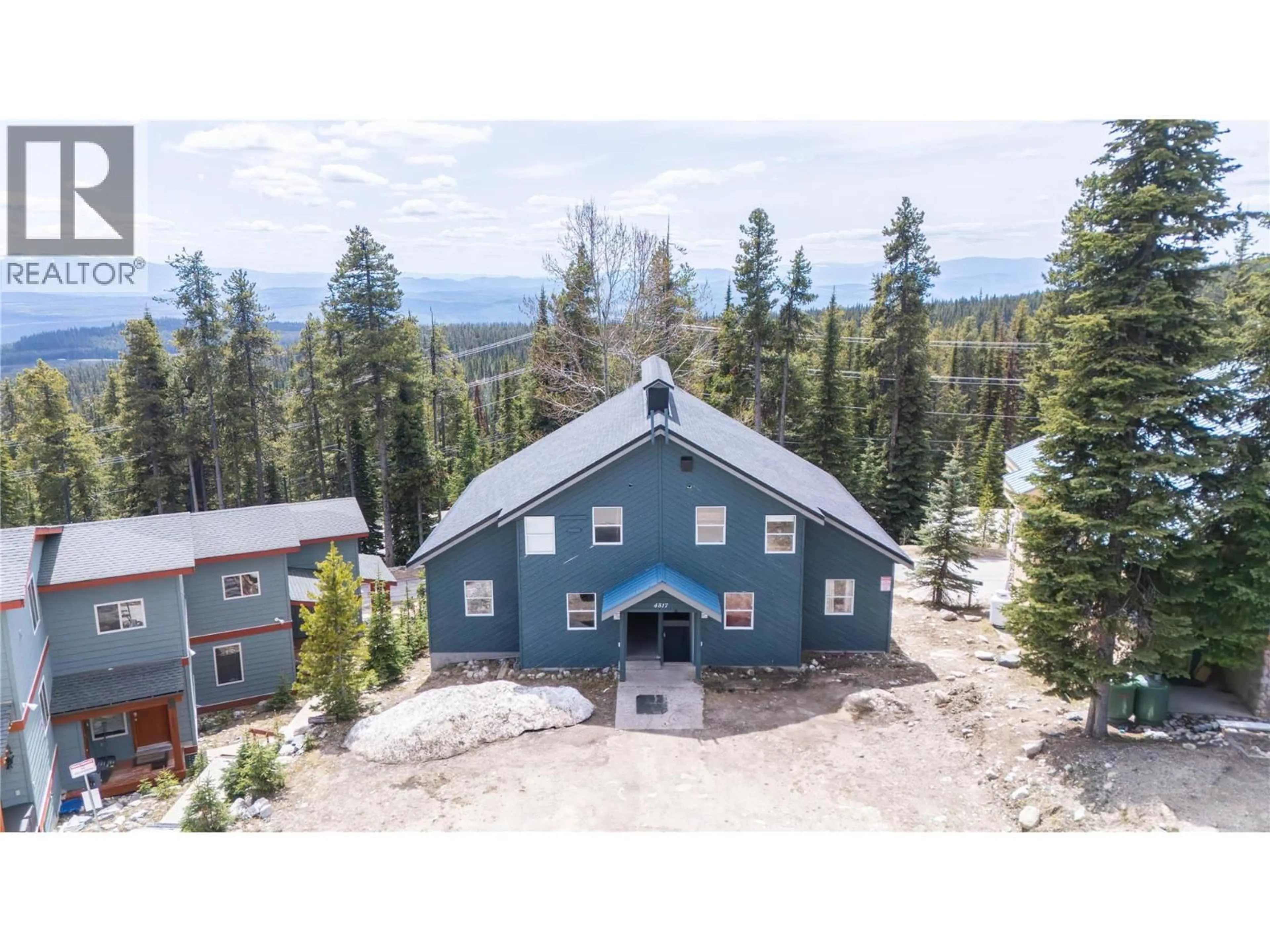 A pic from outside/outdoor area/front of a property/back of a property/a pic from drone, mountain view for C - 4817 SNOWPINES ROAD, Big White British Columbia V1V1P3