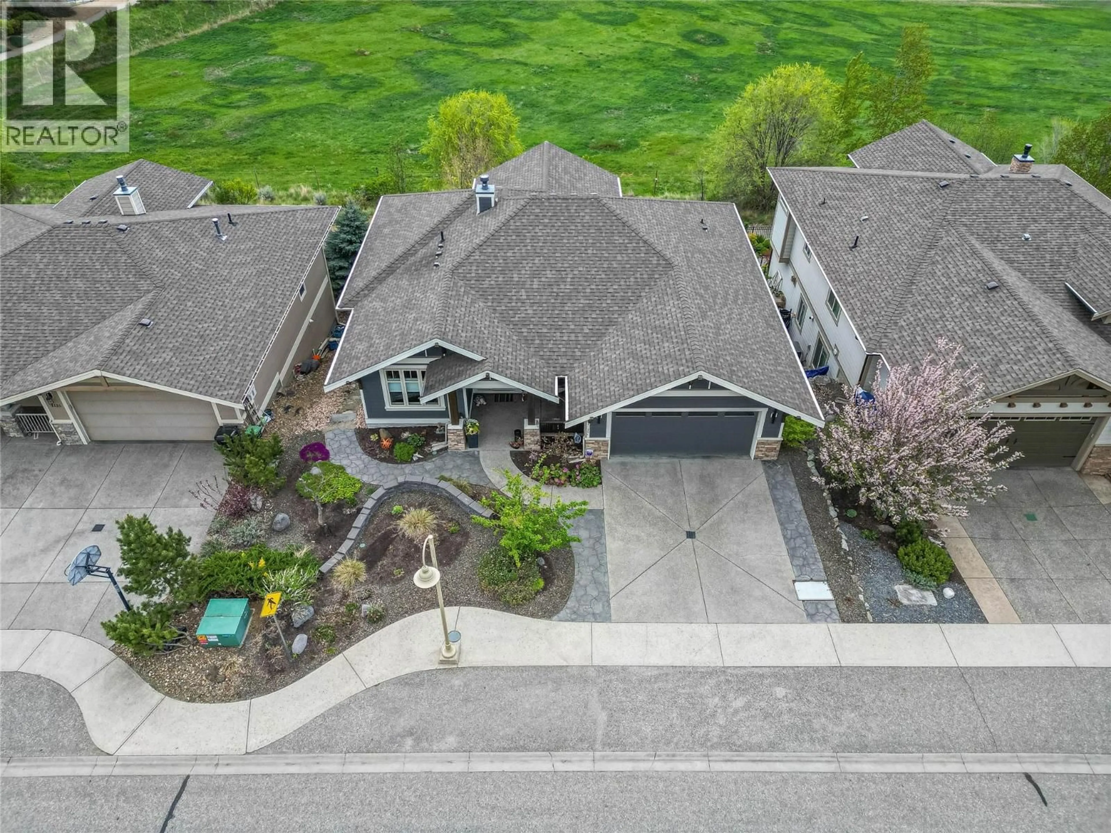 A pic from outside/outdoor area/front of a property/back of a property/a pic from drone, street for 4120 LEATHERBACK ROAD, Vernon British Columbia V1T9W4