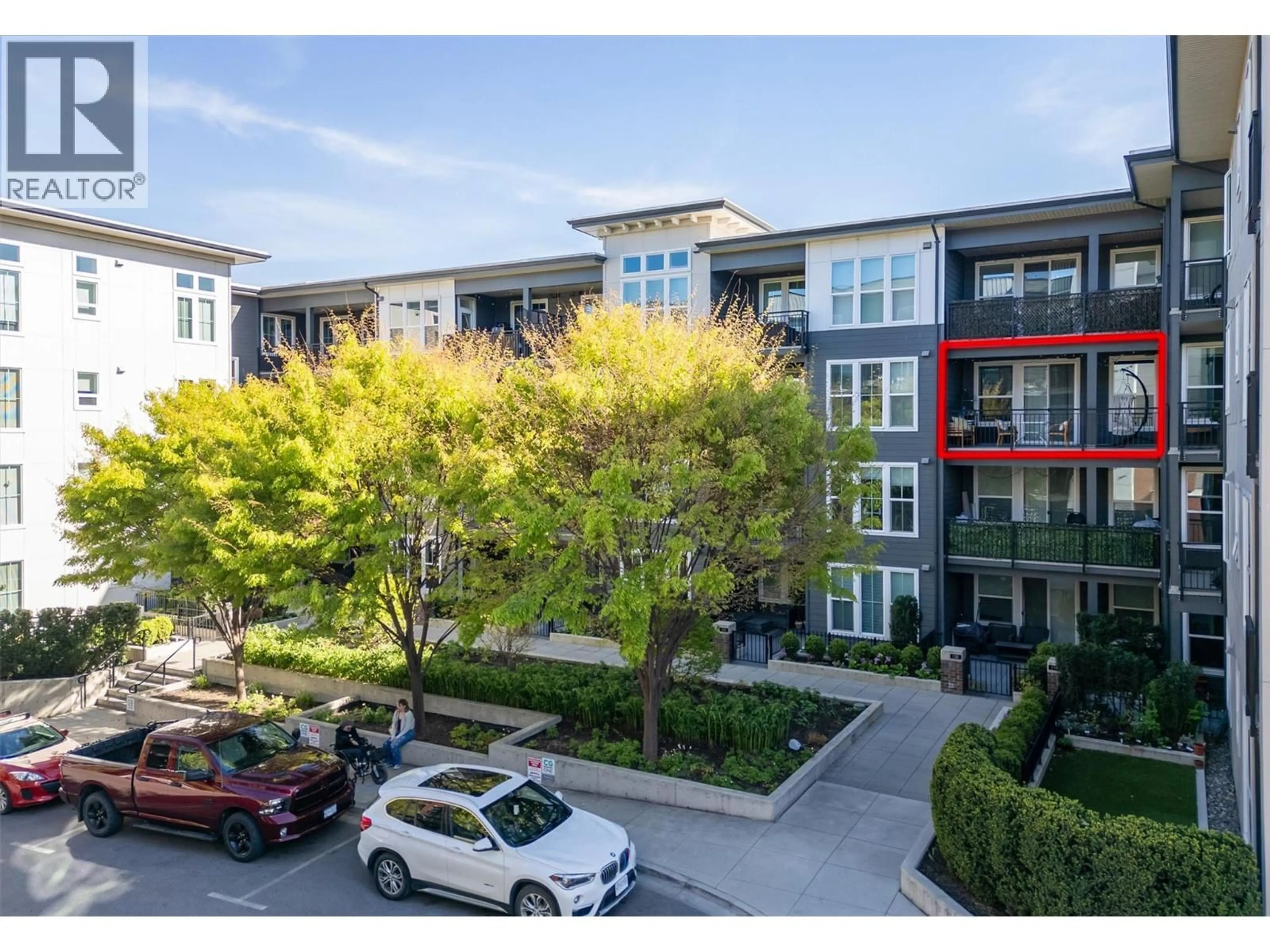 A pic from outside/outdoor area/front of a property/back of a property/a pic from drone, unknown for 320 - 1770 RICHTER STREET, Kelowna British Columbia V1Y0E6