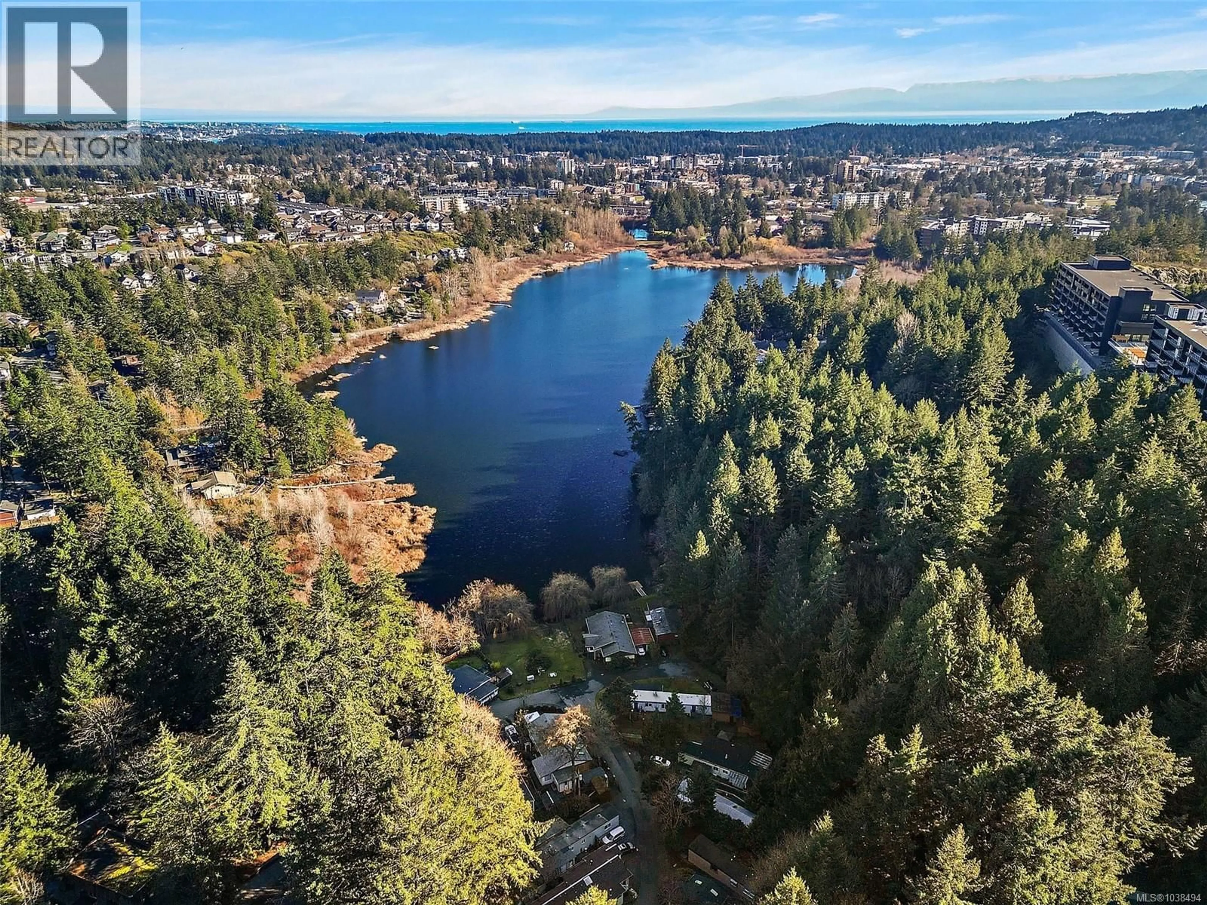 A pic from outside/outdoor area/front of a property/back of a property/a pic from drone, water/lake/river/ocean view for 131 - 2500 FLORENCE LAKE ROAD, Langford British Columbia V9B4H2