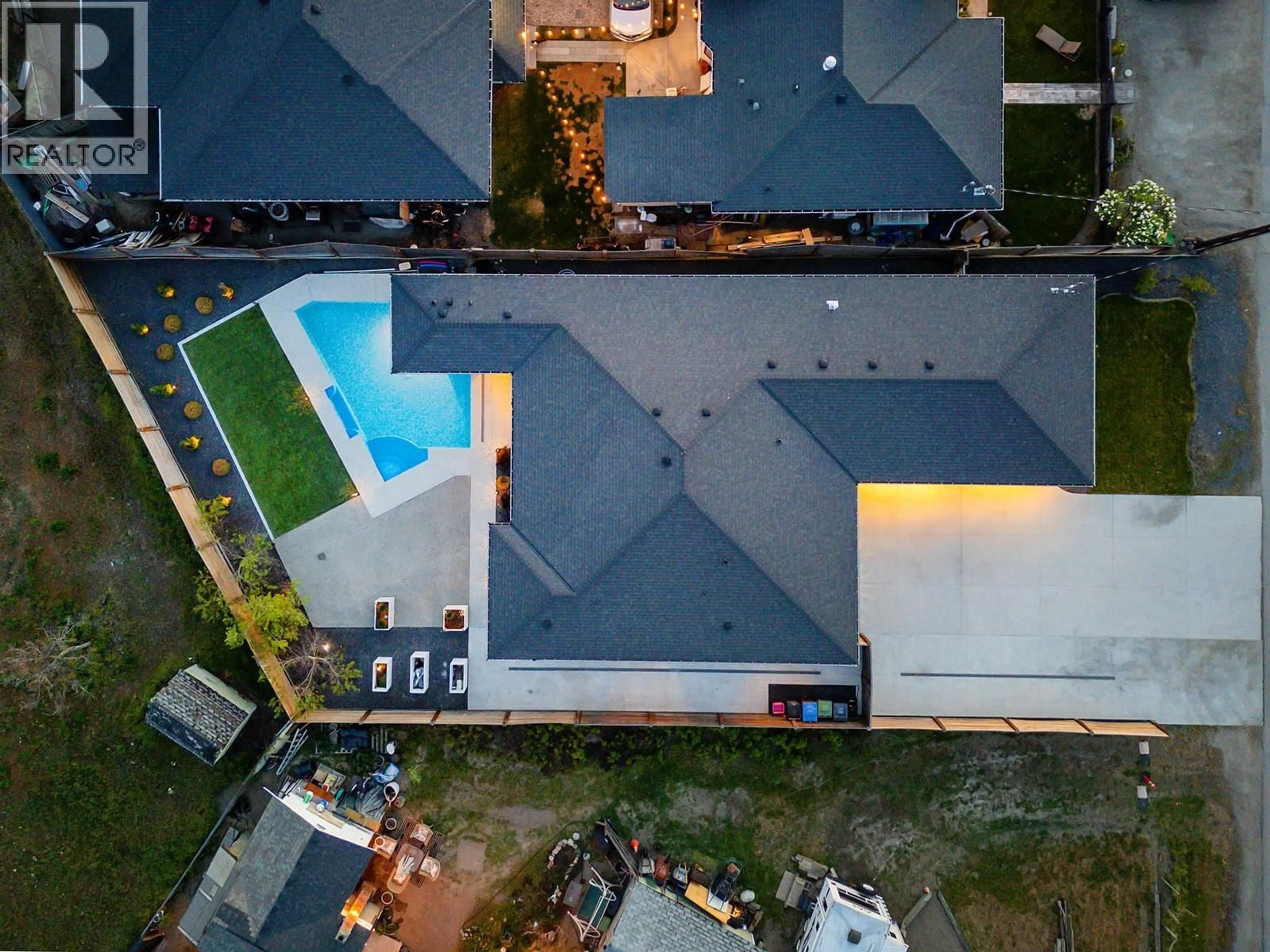A pic from outside/outdoor area/front of a property/back of a property/a pic from drone, unknown for 2095 BYRNS ROAD, Kelowna British Columbia V1W2G3