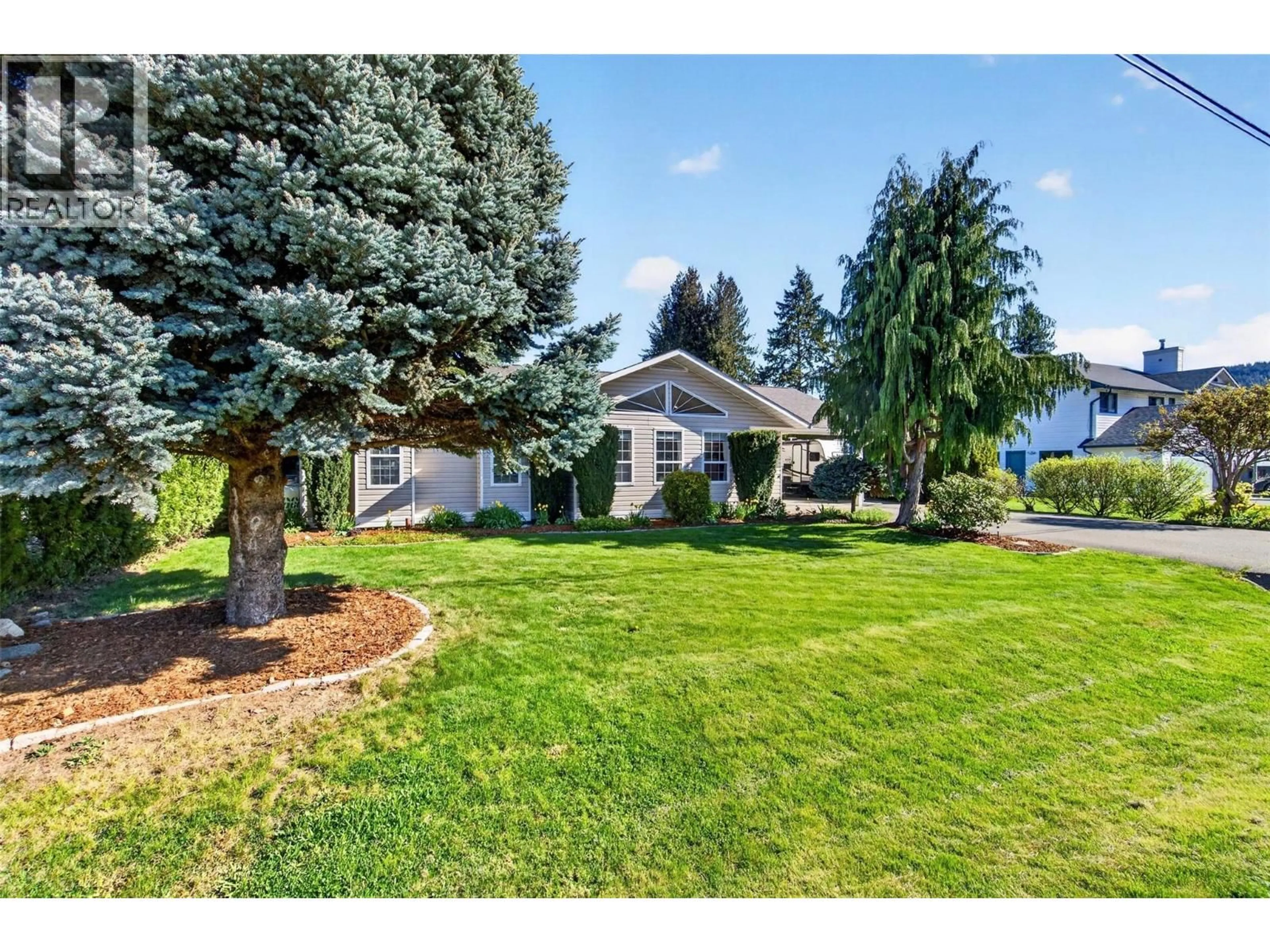 A pic from outside/outdoor area/front of a property/back of a property/a pic from drone, street for 730 PARKSVILLE STREET, Sicamous British Columbia V0E2V0