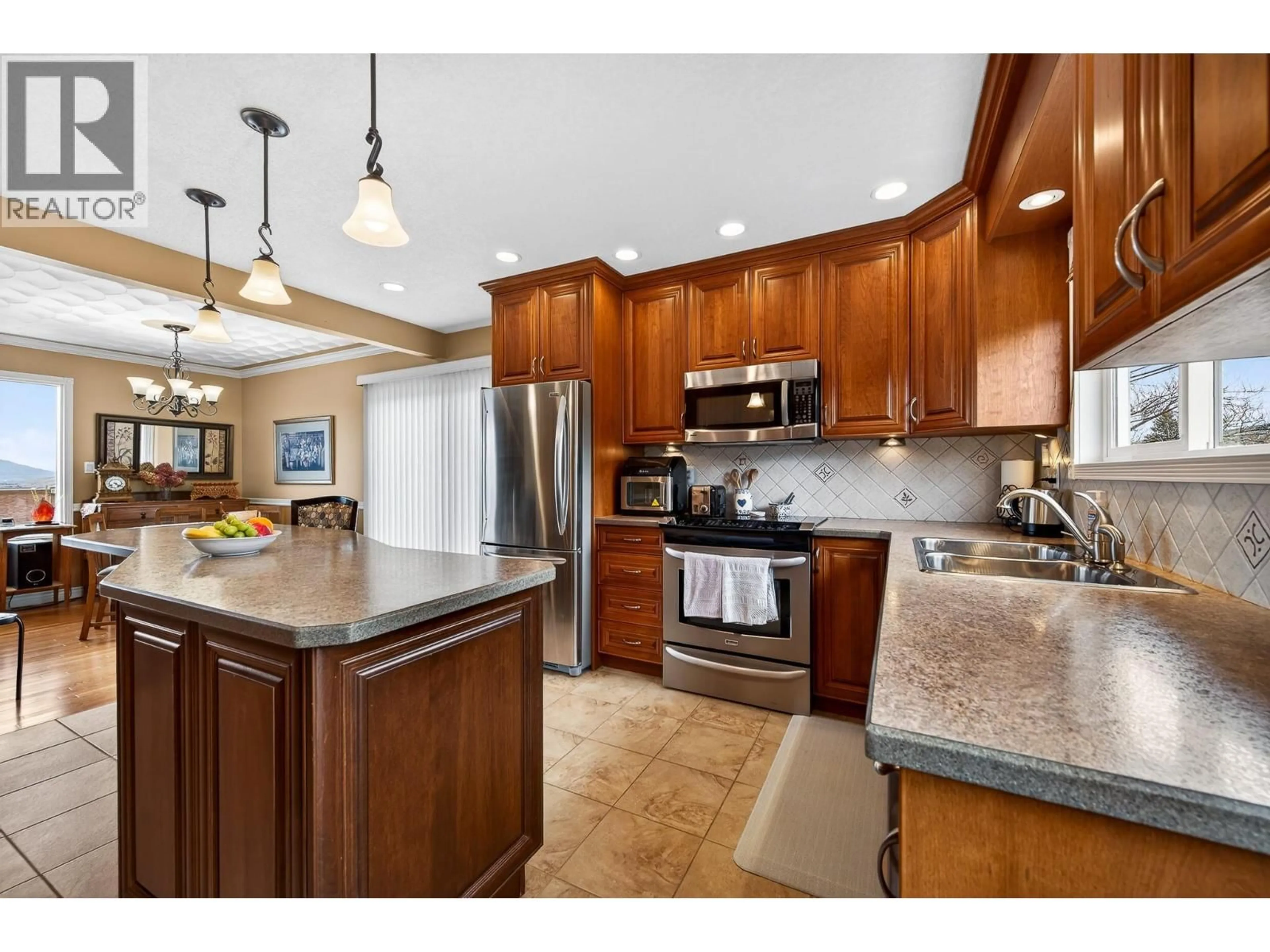 Open concept kitchen, ceramic/tile floor for 694 LOMBARD STREET, Kamloops British Columbia V2C5W6