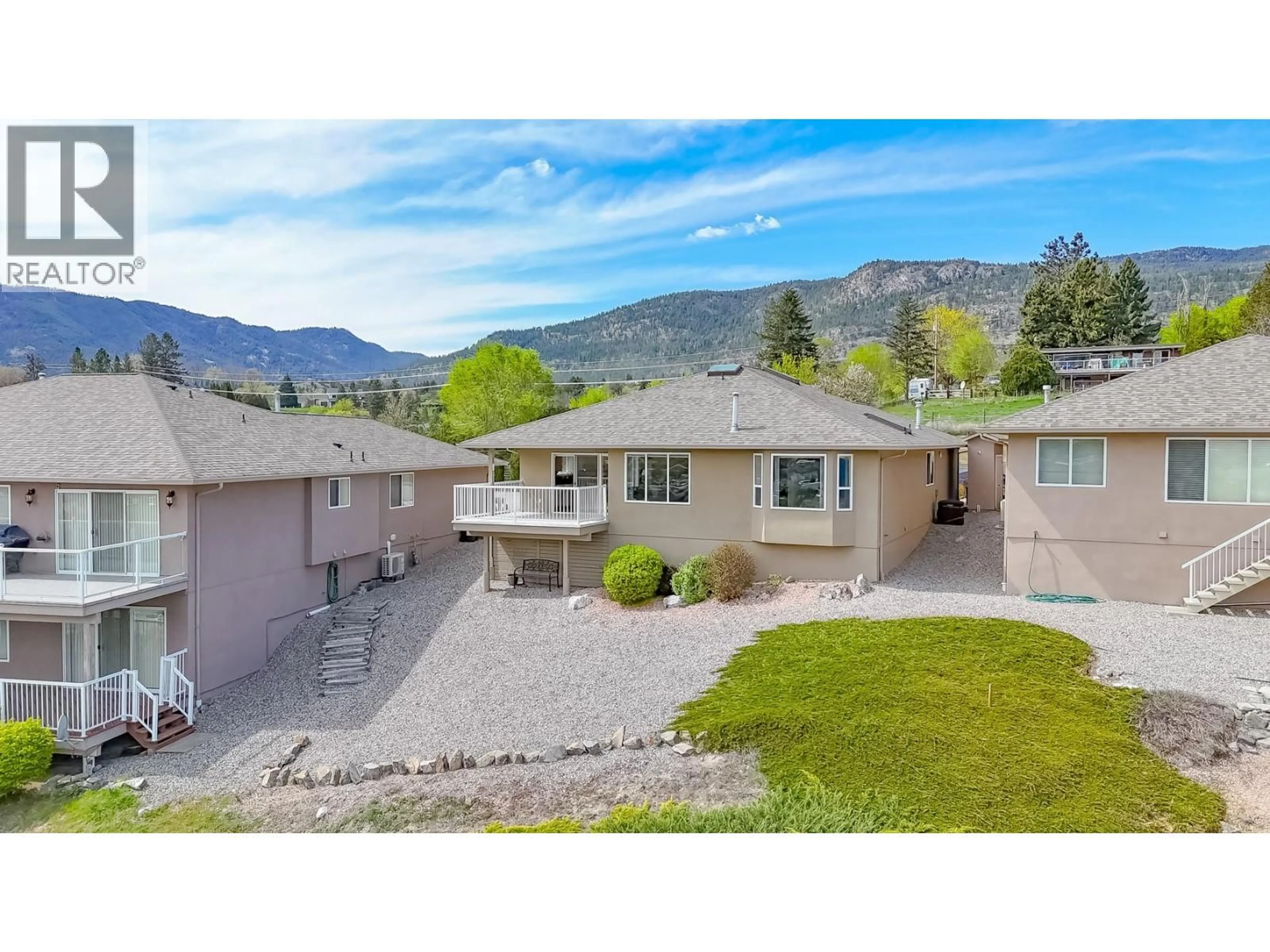 A pic from outside/outdoor area/front of a property/back of a property/a pic from drone, mountain view for 404 RIDGE COURT, Penticton British Columbia V2A8N7