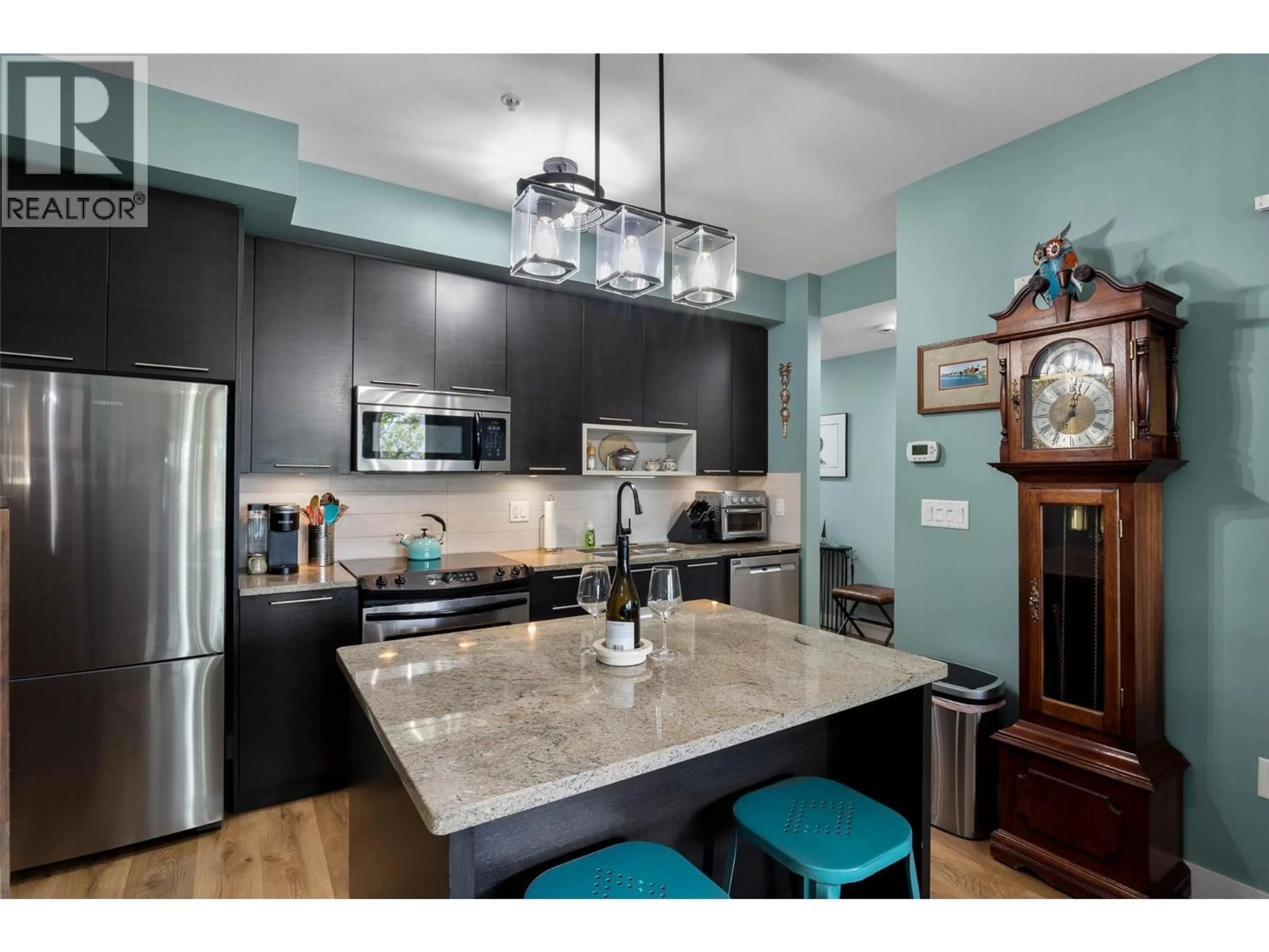 Open concept kitchen, ceramic/tile floor for 1301 - 1000 TALASA WAY, Kamloops British Columbia V2H0C2
