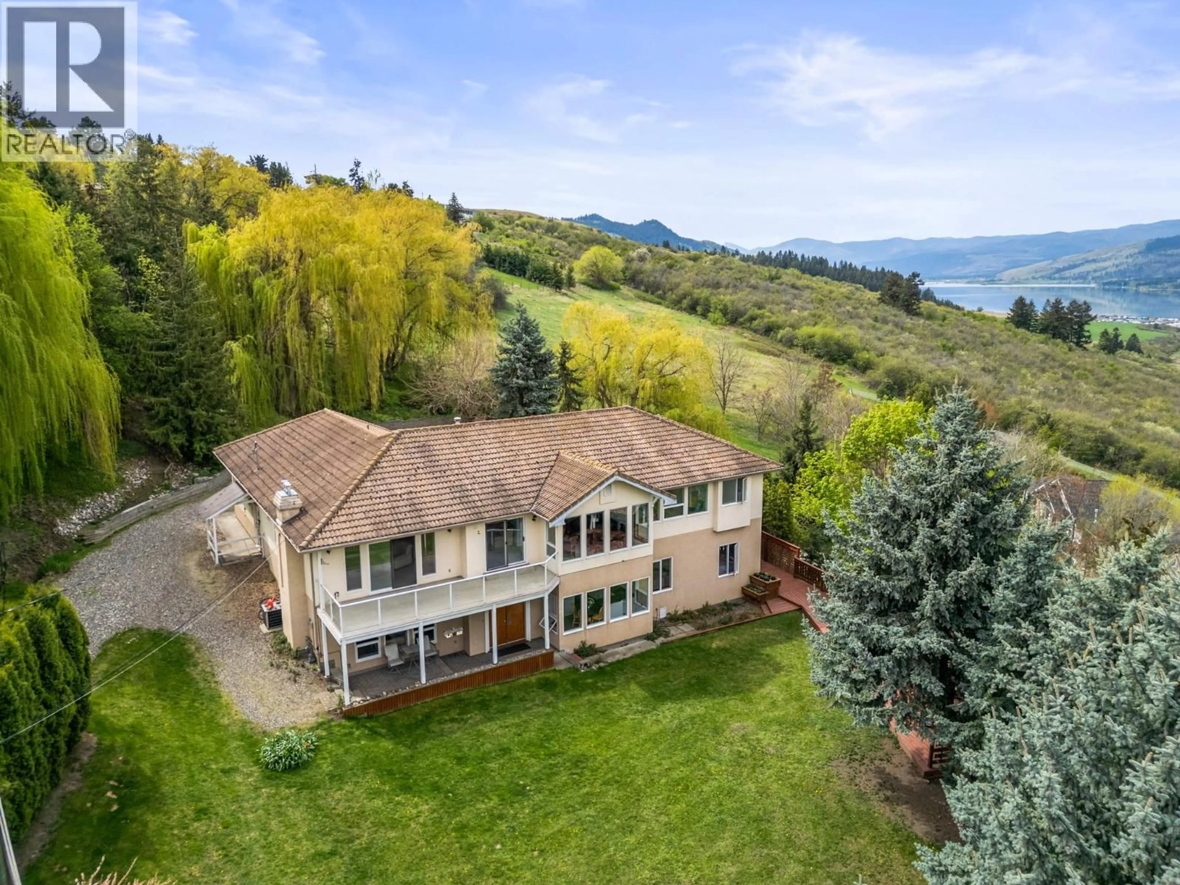 A pic from outside/outdoor area/front of a property/back of a property/a pic from drone, water/lake/river/ocean view for 363 NORTHWIND DRIVE, Vernon British Columbia V1H1X1