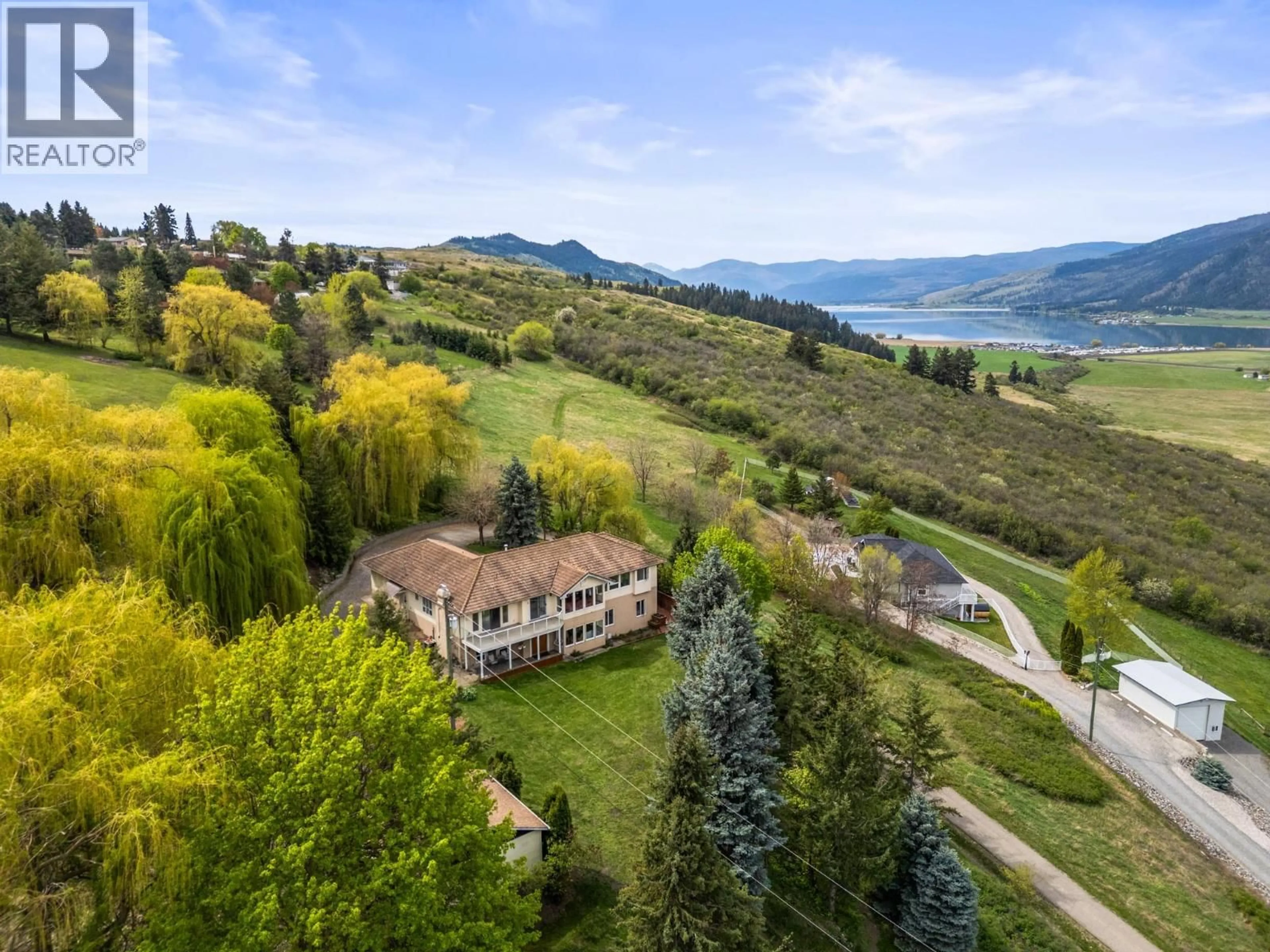 A pic from outside/outdoor area/front of a property/back of a property/a pic from drone, water/lake/river/ocean view for 363 NORTHWIND DRIVE, Vernon British Columbia V1H1X1