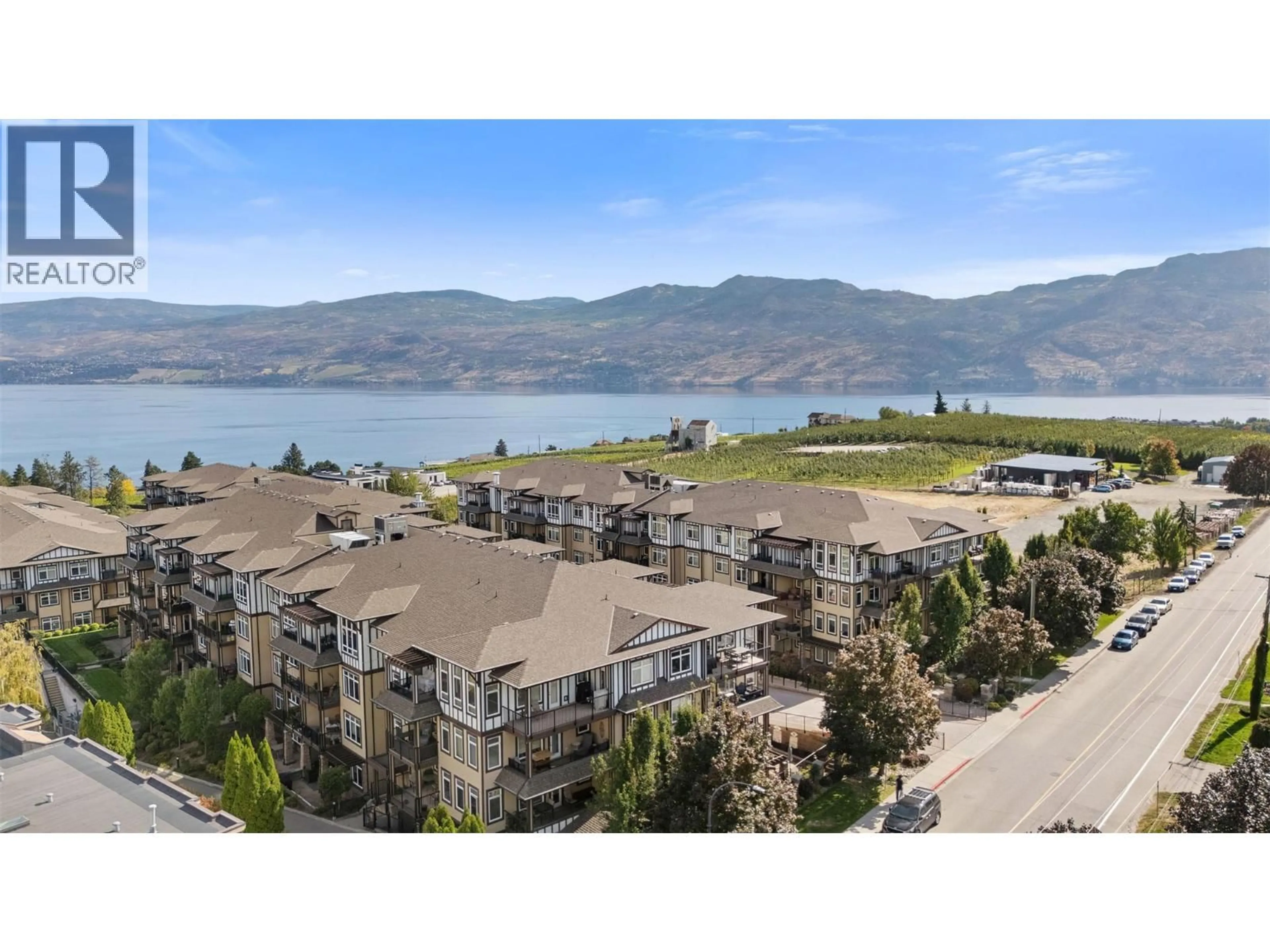 A pic from outside/outdoor area/front of a property/back of a property/a pic from drone, water/lake/river/ocean view for 1203 - 3833 BROWN ROAD, West Kelowna British Columbia V4T2J3