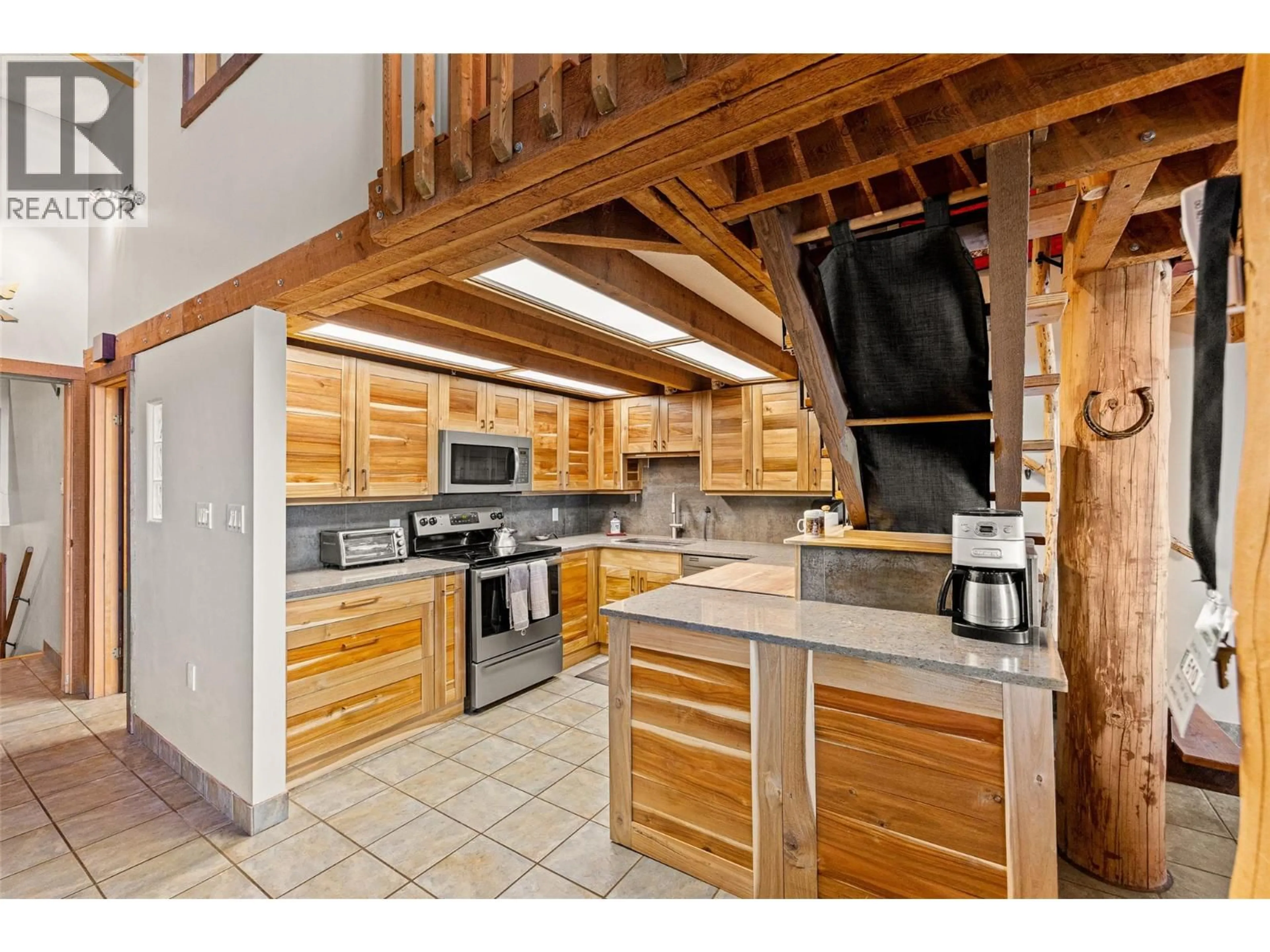 Open concept kitchen, unknown for 610 - 7470 PORCUPINE ROAD, Big White British Columbia V1X4K5