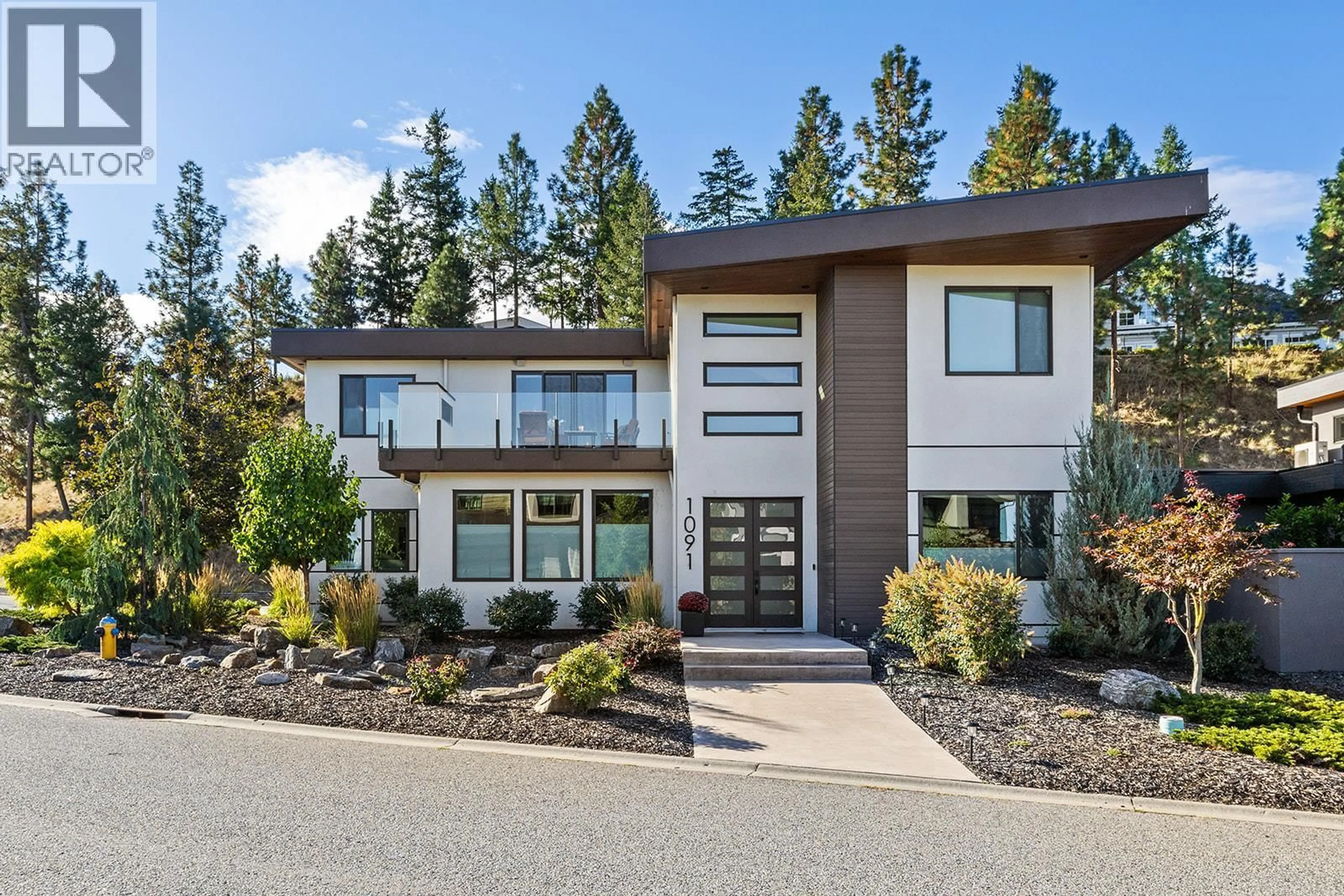 Home with vinyl exterior material, mountain view for 1091 WESTPOINT DRIVE, Kelowna British Columbia V1W4Z9
