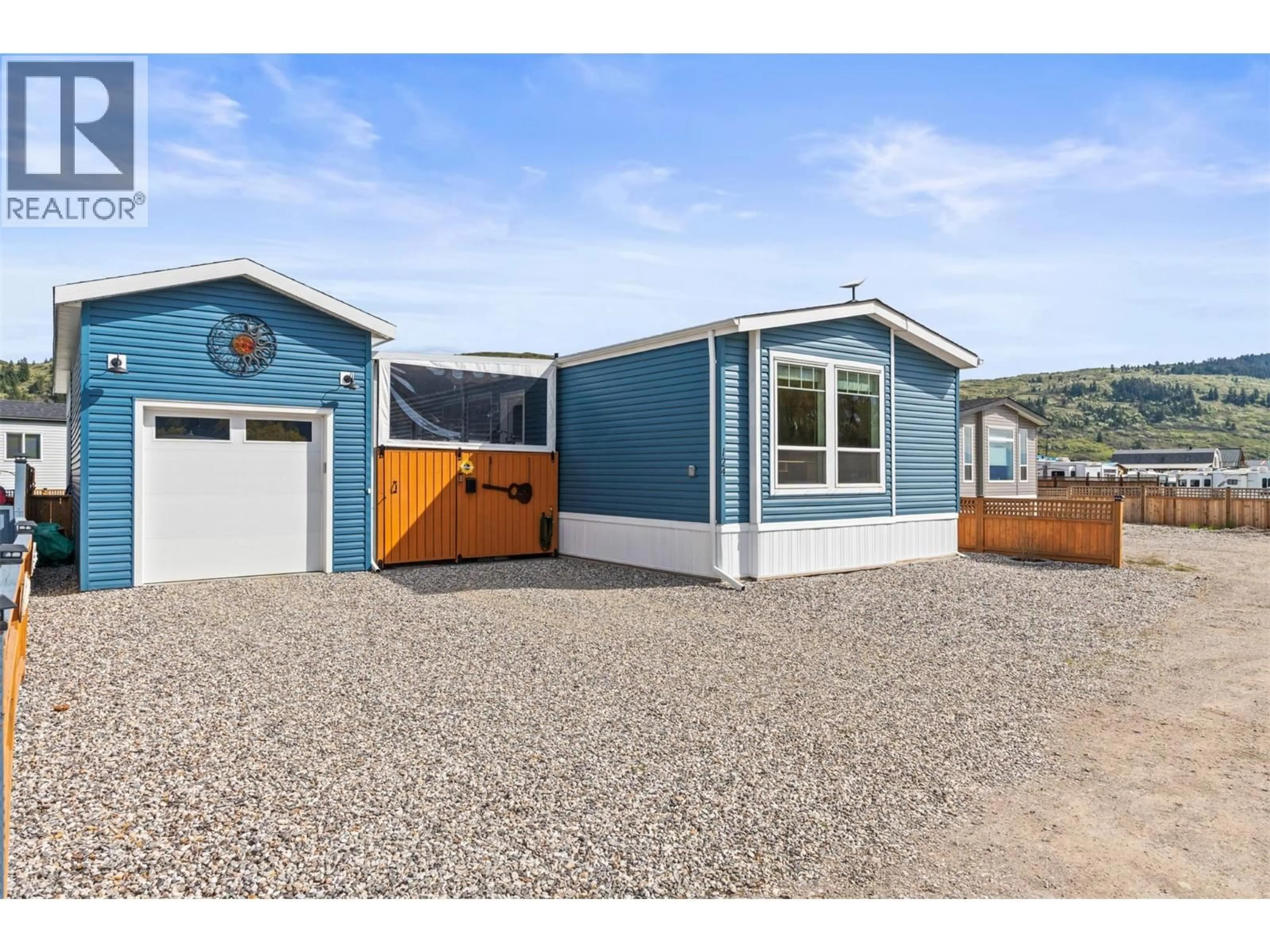 Home with vinyl exterior material, street for 124 - 63 ANTOINE ROAD, Vernon British Columbia V1H2A3