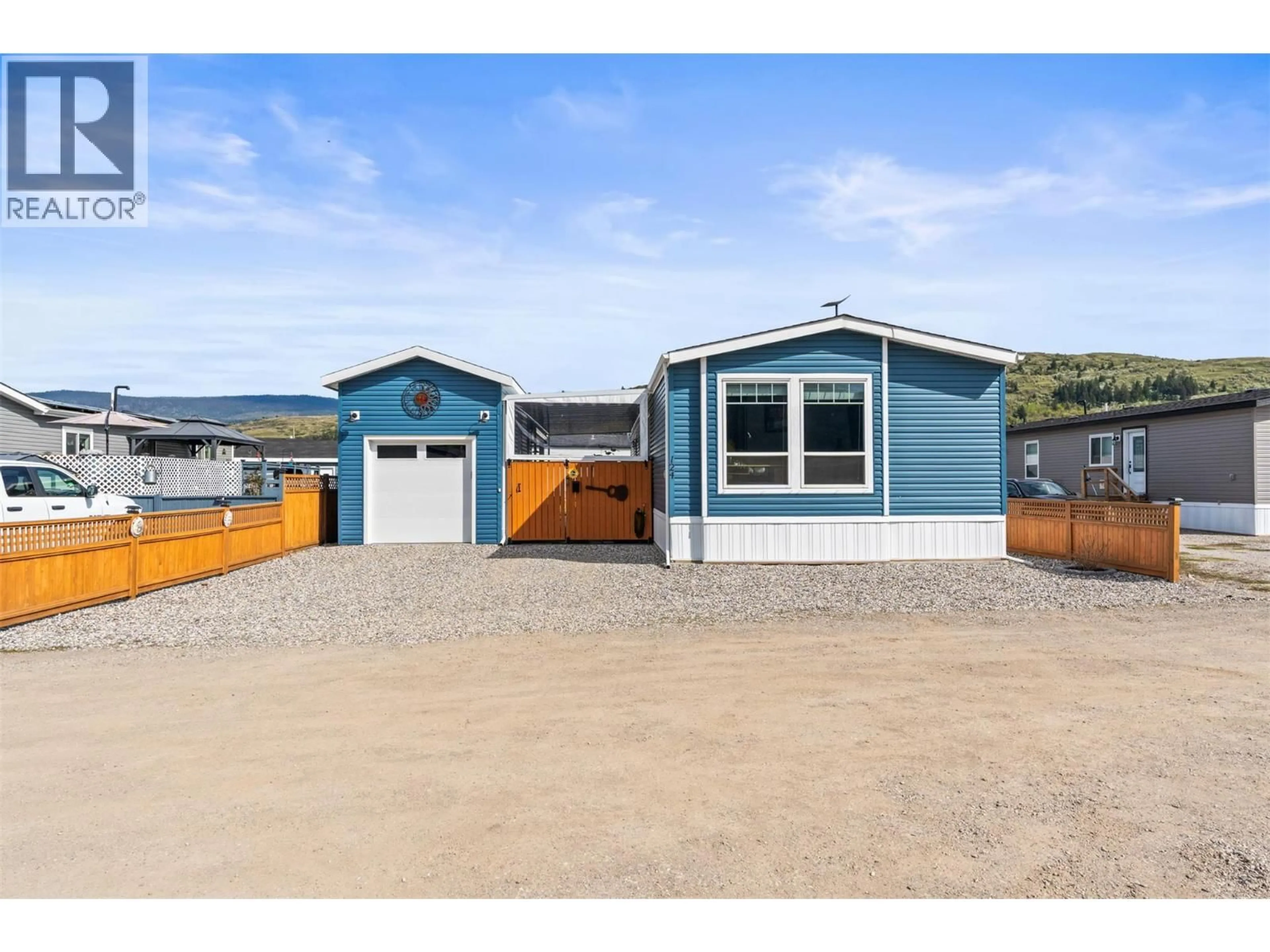 Home with vinyl exterior material, street for 124 - 63 ANTOINE ROAD, Vernon British Columbia V1H2A3