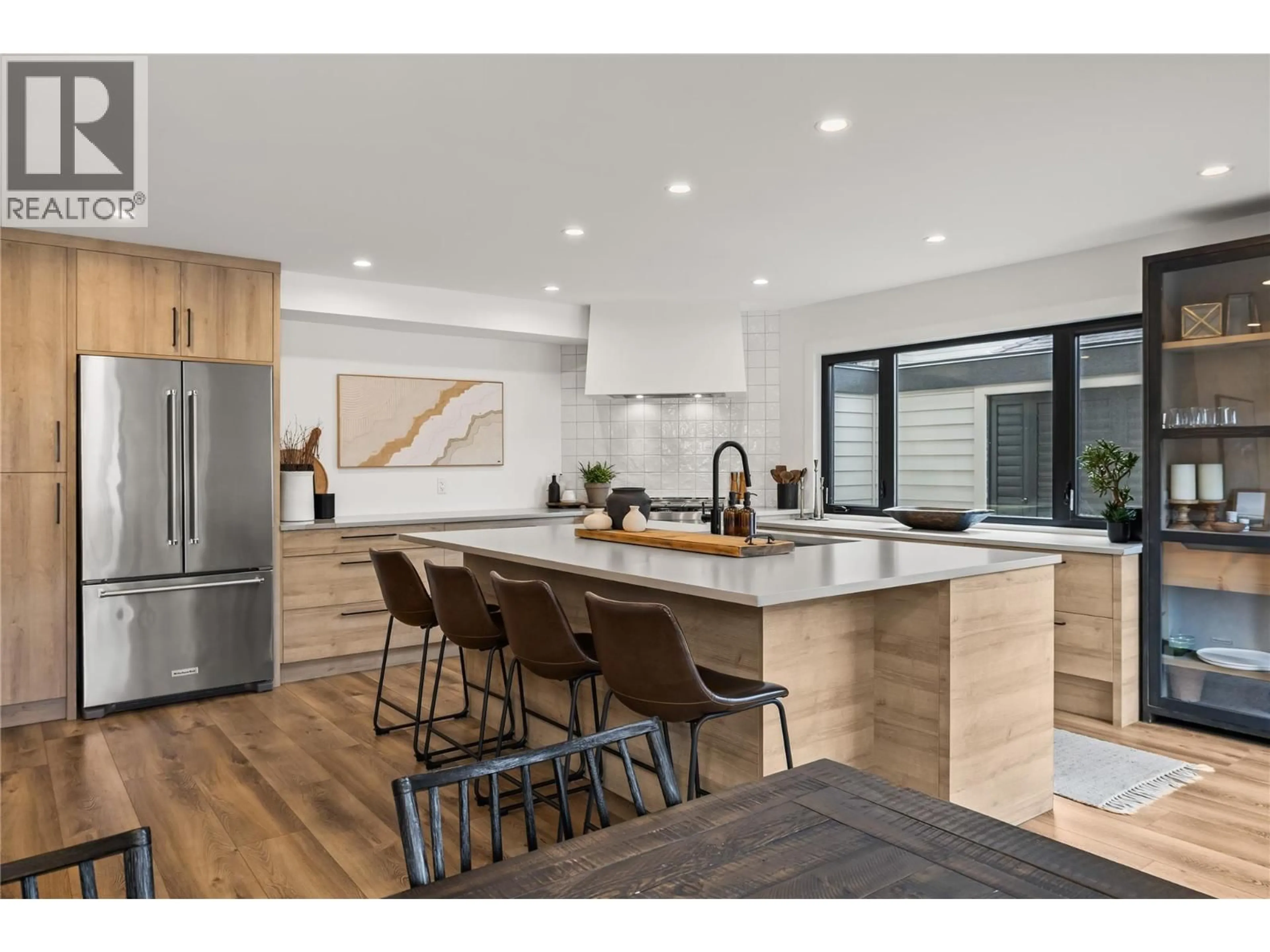 Open concept kitchen, wood/laminate floor for 2831 ABBOTT STREET, Kelowna British Columbia V1Y1G5