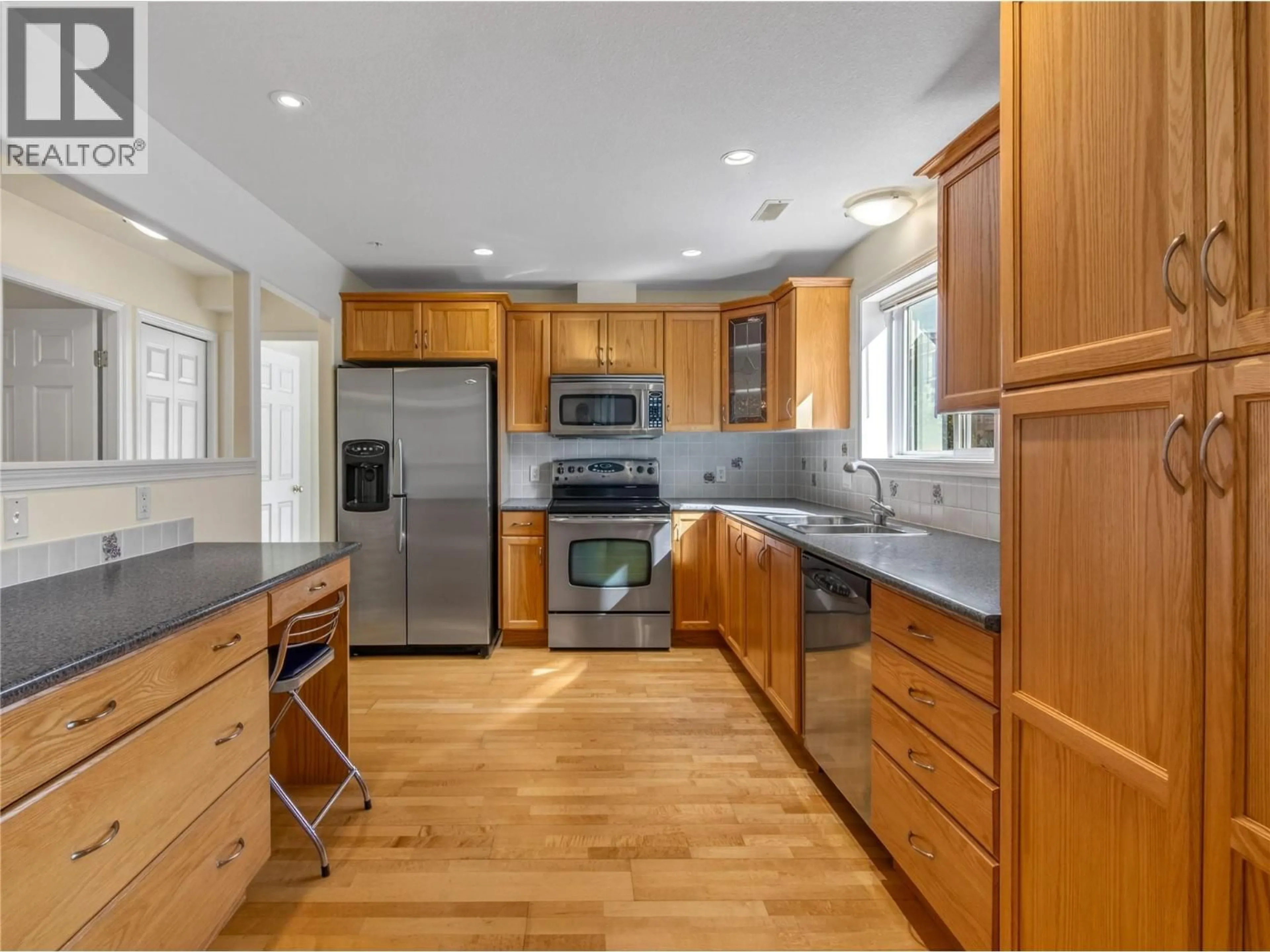 Open concept kitchen, unknown for 404 - 2285 ATKINSON STREET, Penticton British Columbia V2A8R7