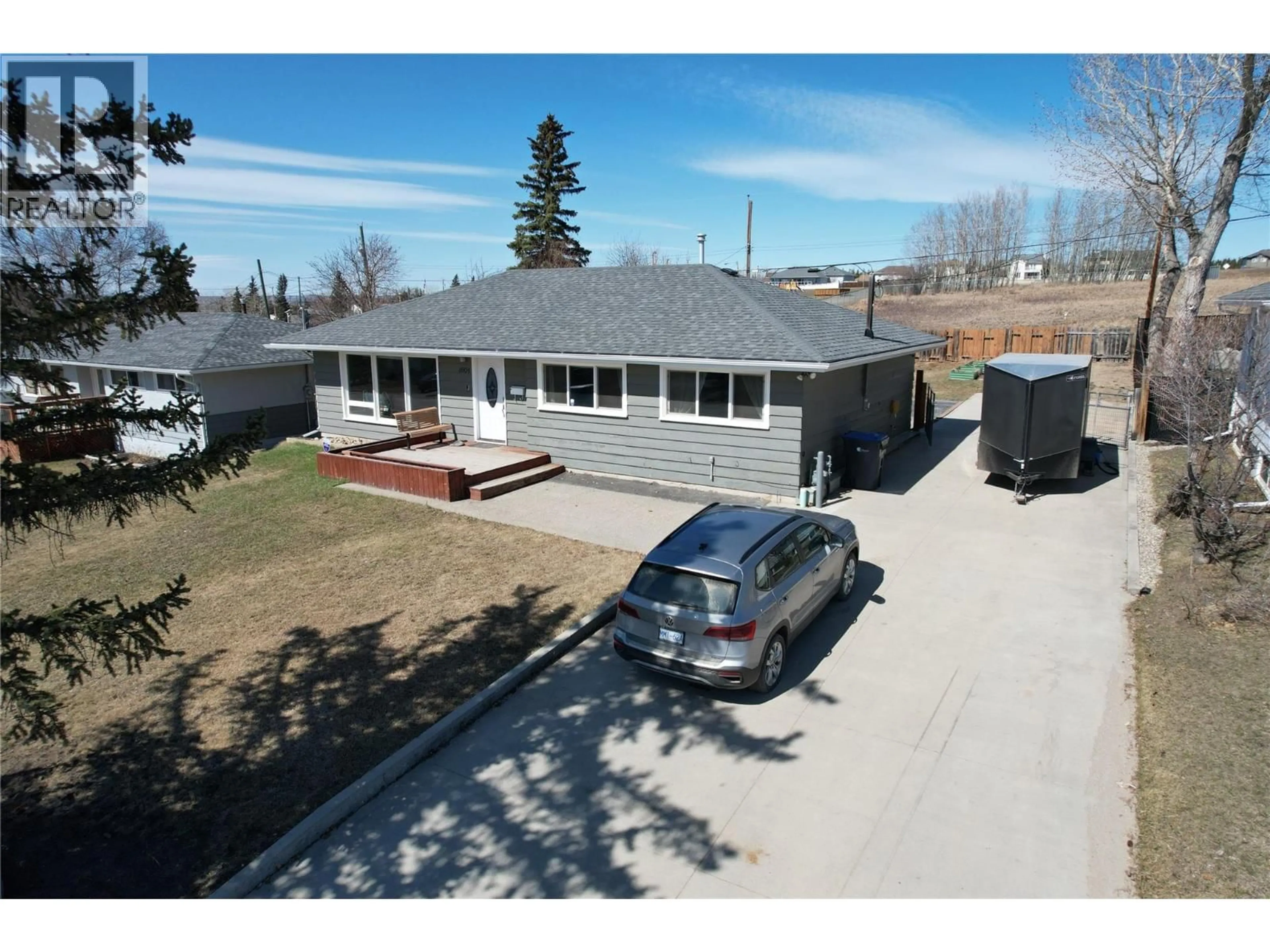 A pic from outside/outdoor area/front of a property/back of a property/a pic from drone, street for 1604 94 AVENUE, Dawson Creek British Columbia V1G1H1