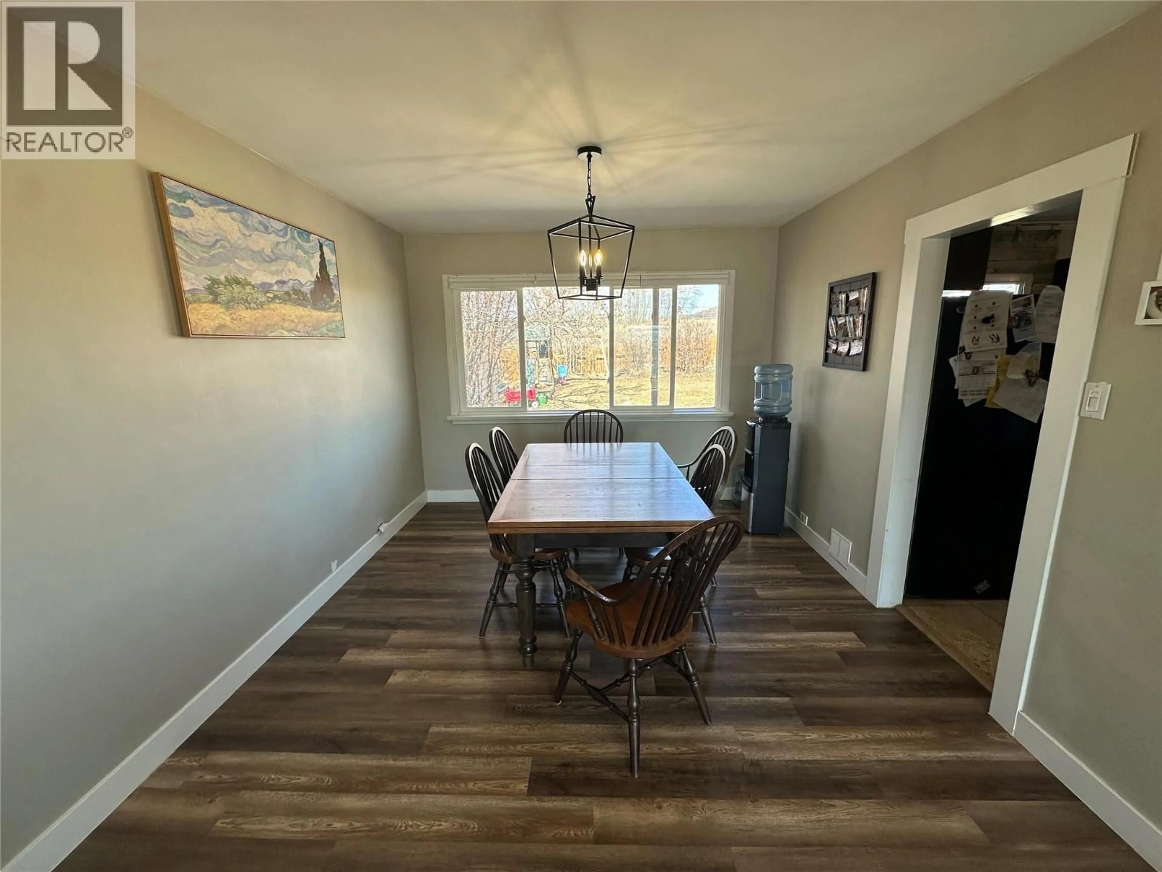 Dining room, wood/laminate floor for 1604 94 AVENUE, Dawson Creek British Columbia V1G1H1