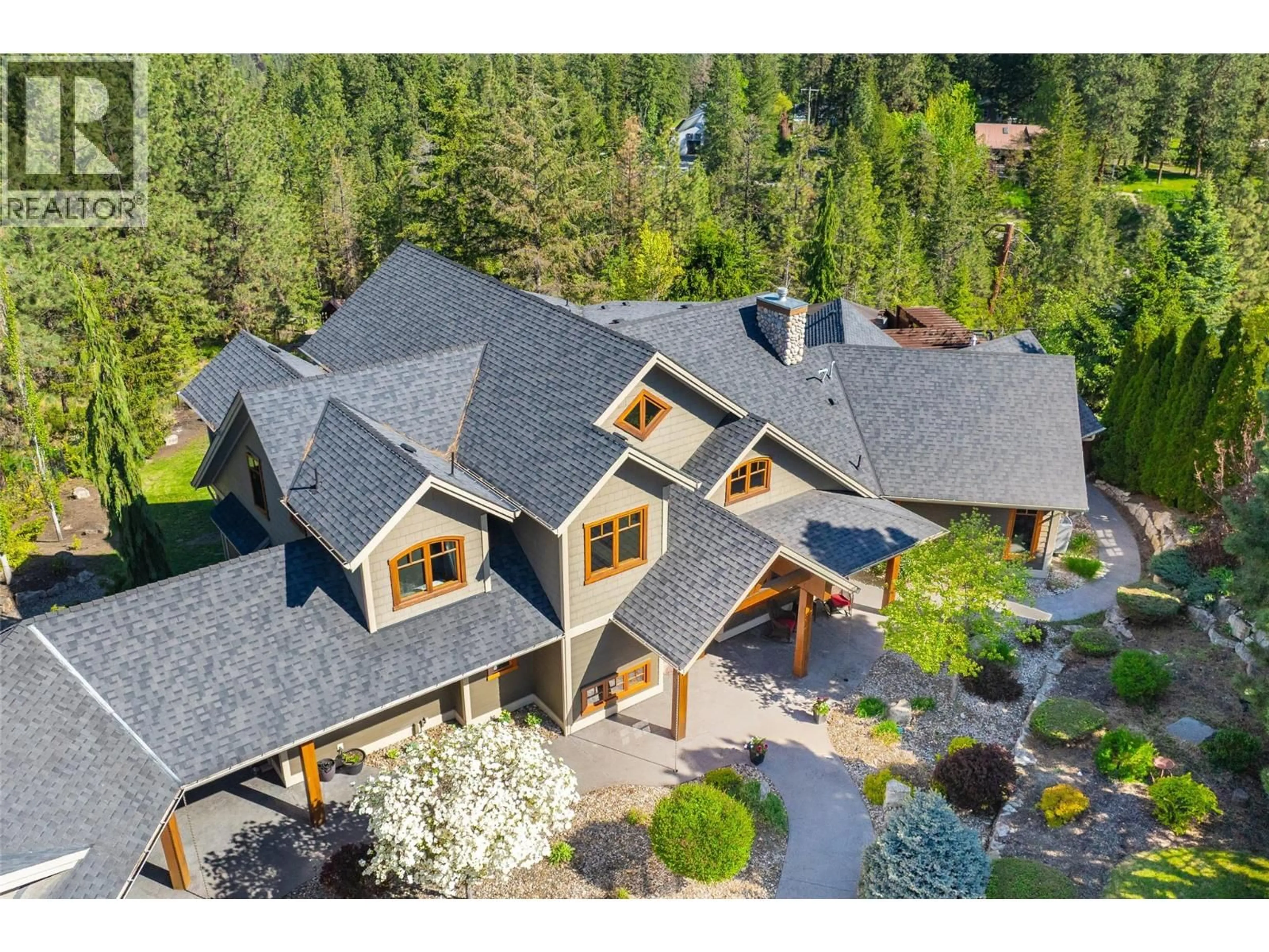 A pic from outside/outdoor area/front of a property/back of a property/a pic from drone, mountain view for 4150 SEDDON ROAD, Kelowna British Columbia V1W4C9
