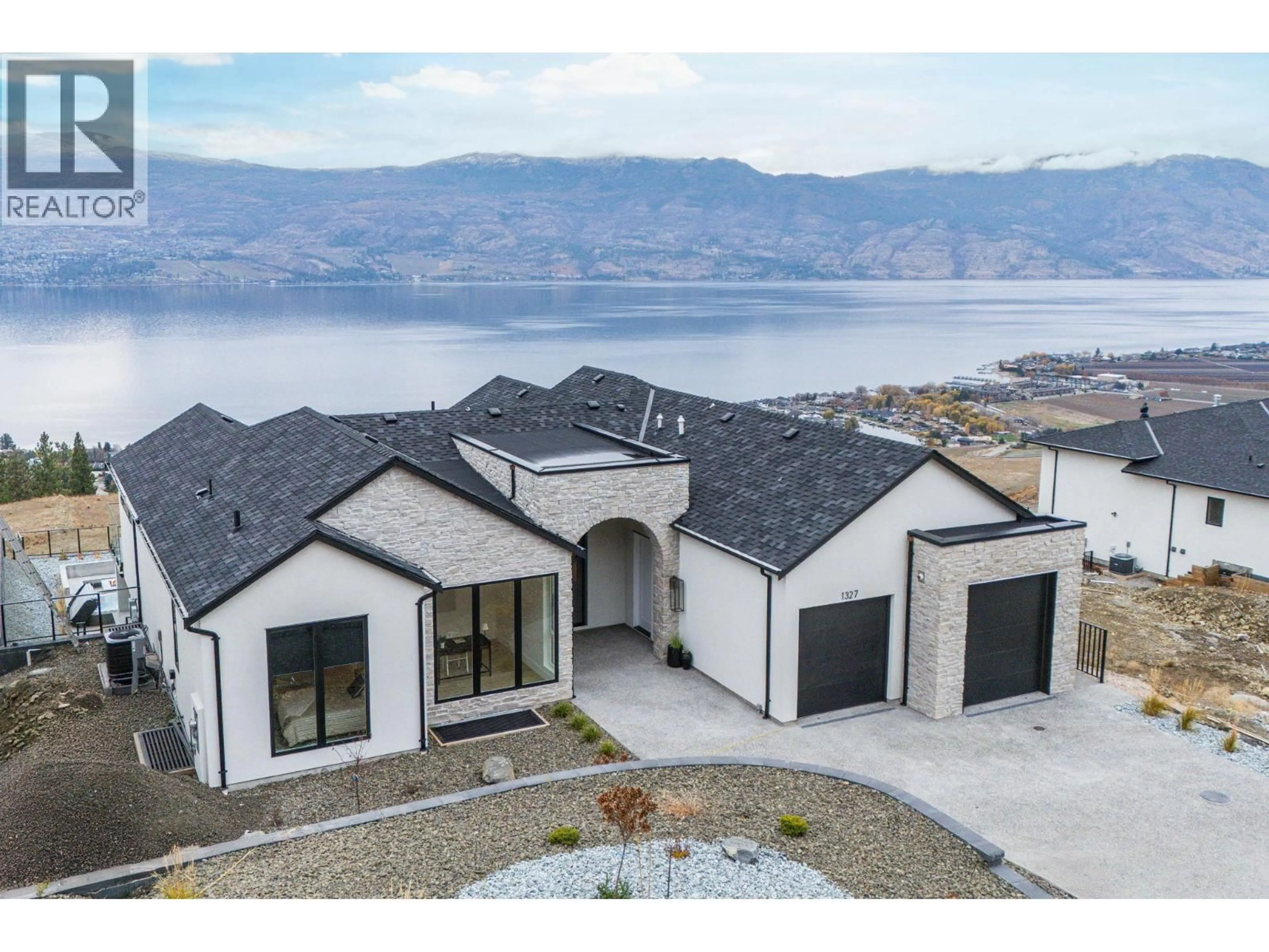 A pic from outside/outdoor area/front of a property/back of a property/a pic from drone, water/lake/river/ocean view for 1327 VINEYARD DRIVE, West Kelowna British Columbia V4T3H9