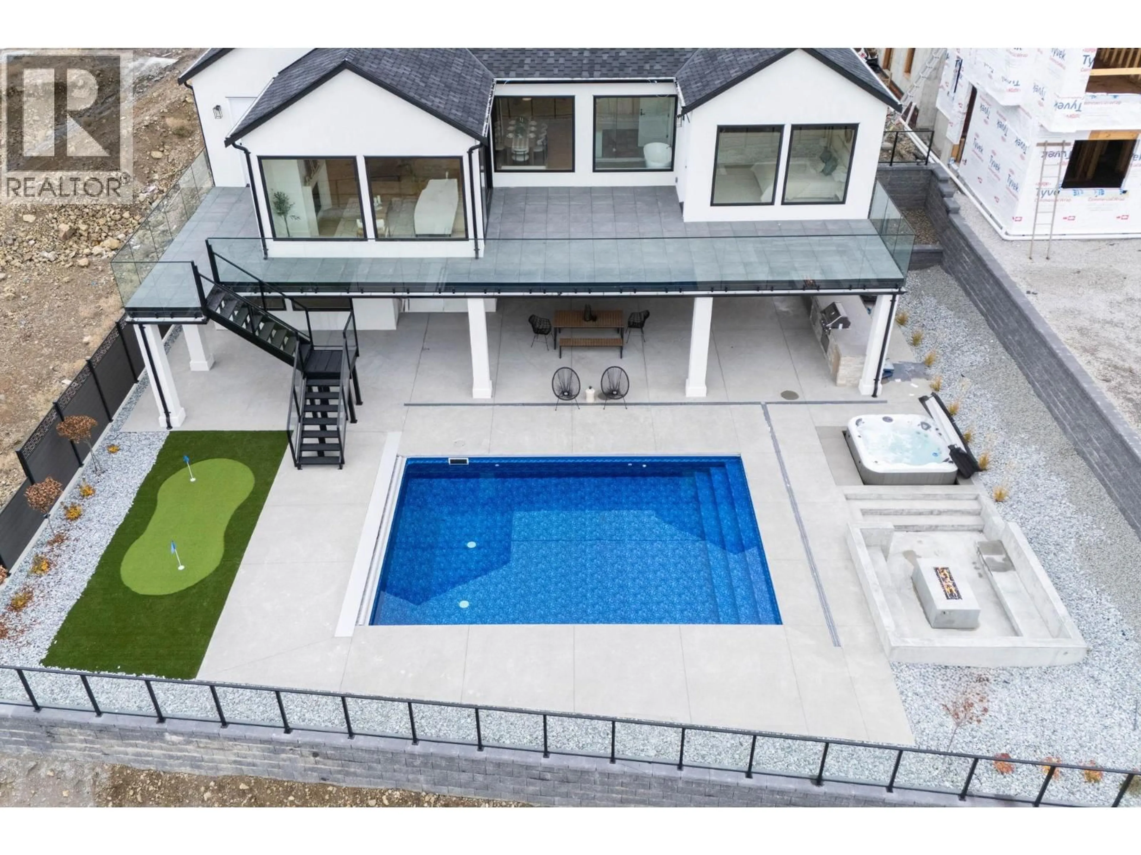 A pic from outside/outdoor area/front of a property/back of a property/a pic from drone, street for 1327 VINEYARD DRIVE, West Kelowna British Columbia V4T3H9