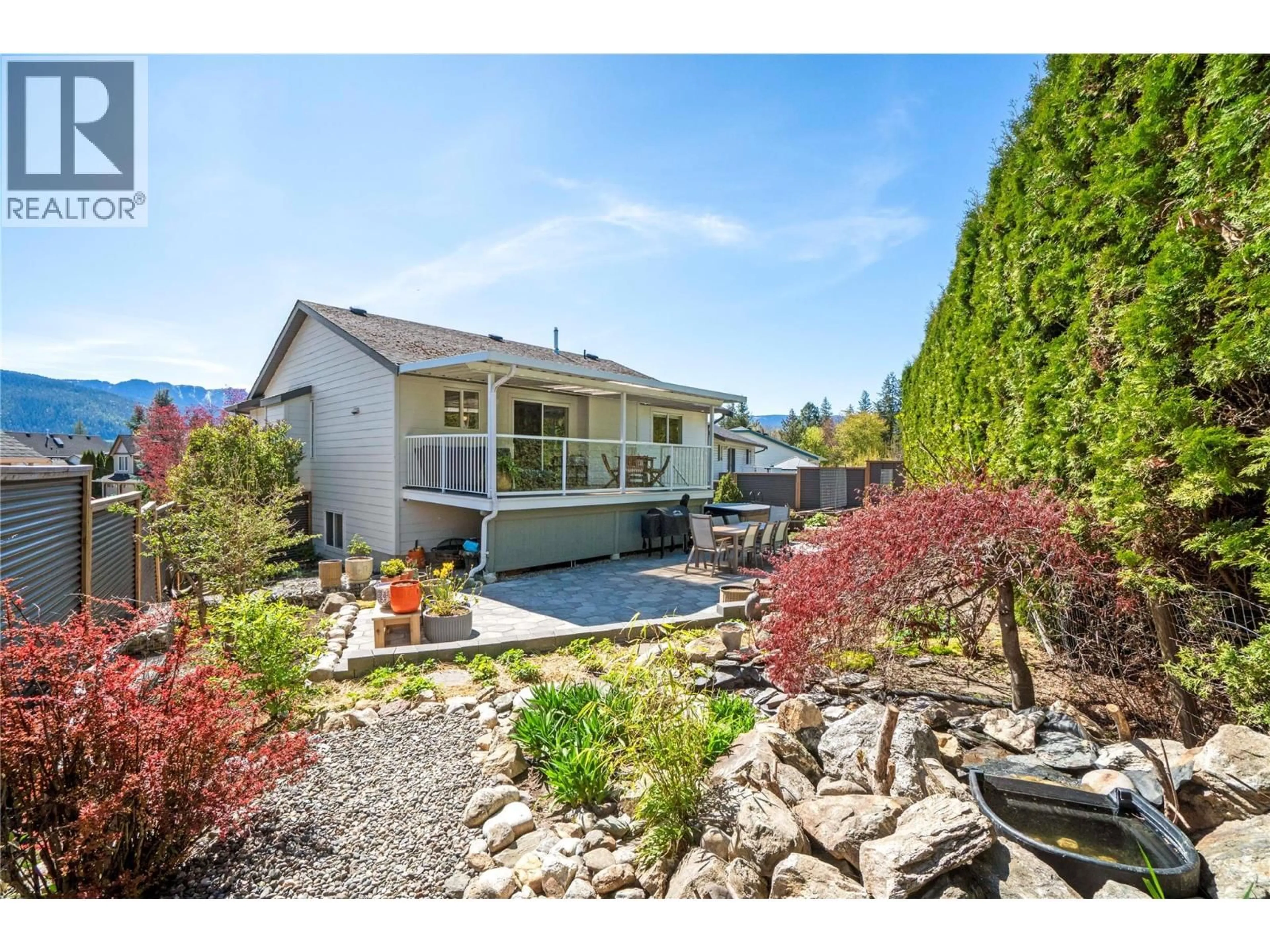 A pic from outside/outdoor area/front of a property/back of a property/a pic from drone, water/lake/river/ocean view for 3061 18 AVENUE NORTHEAST, Salmon Arm British Columbia V1E1P5