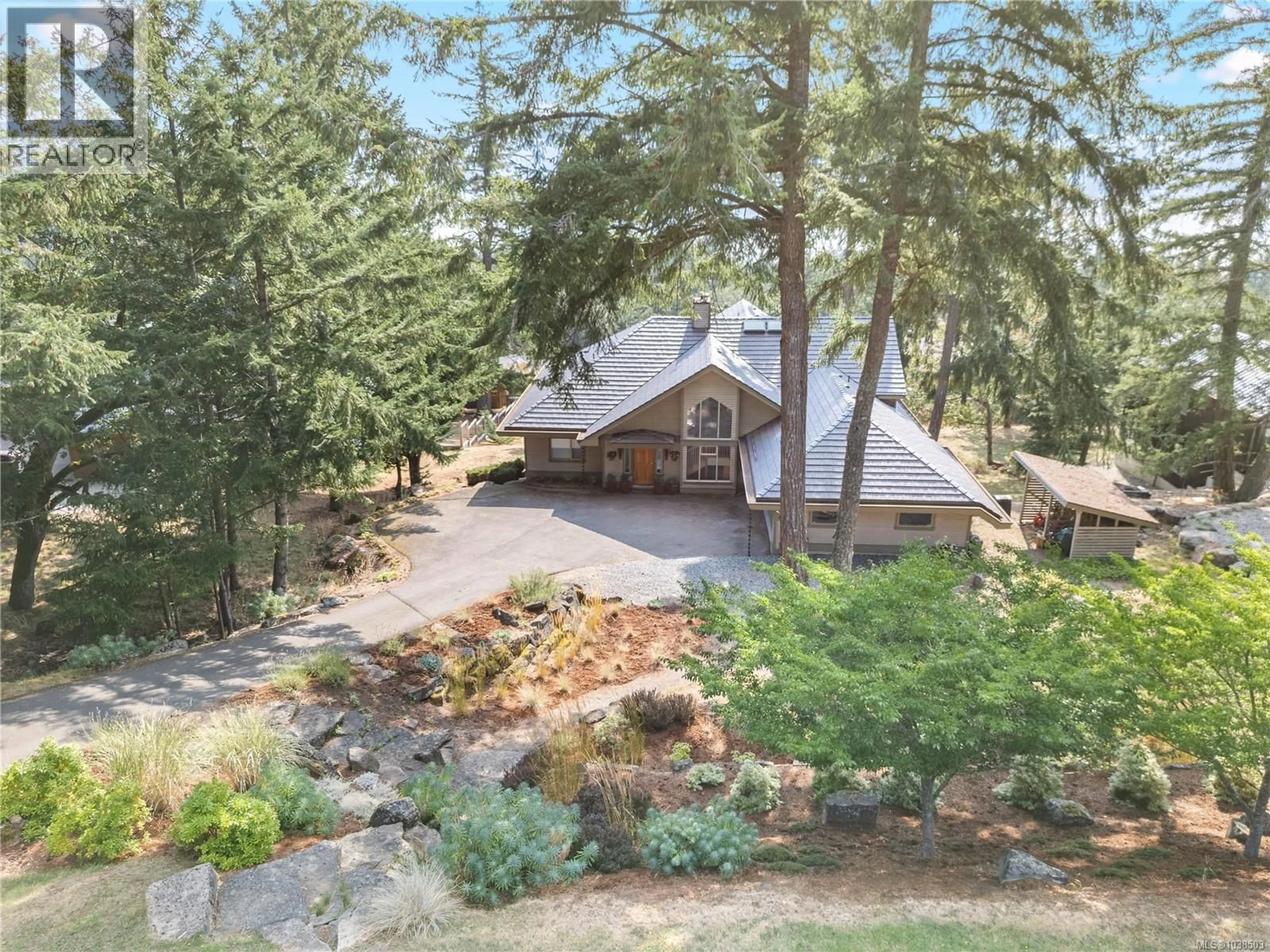 A pic from outside/outdoor area/front of a property/back of a property/a pic from drone, forest/trees view for 235 CANVASBACK PLACE, Salt Spring British Columbia V8K2W5