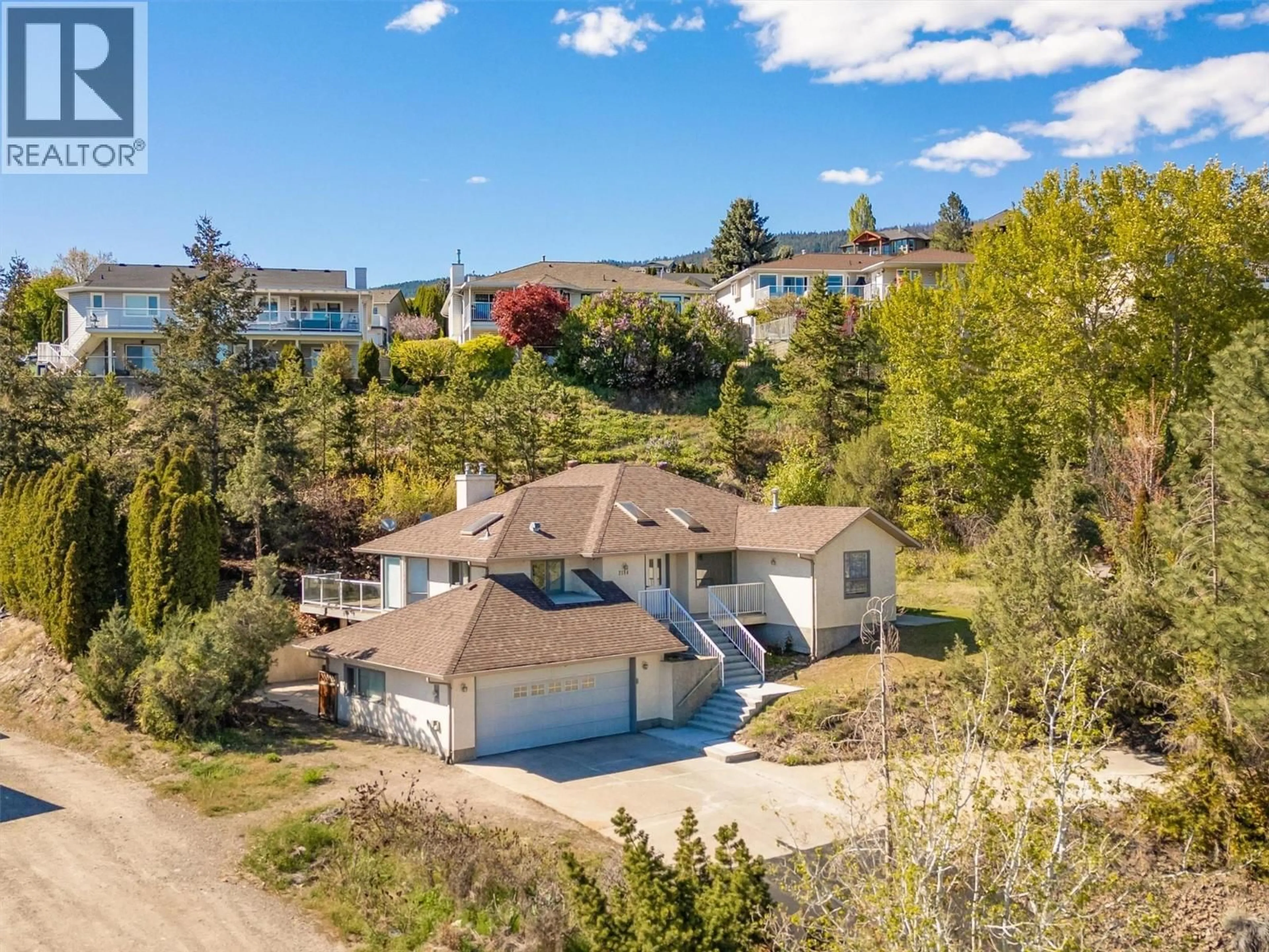 A pic from outside/outdoor area/front of a property/back of a property/a pic from drone, mountain view for 2194 SHAMROCK DRIVE, West Kelowna British Columbia V4T1T9