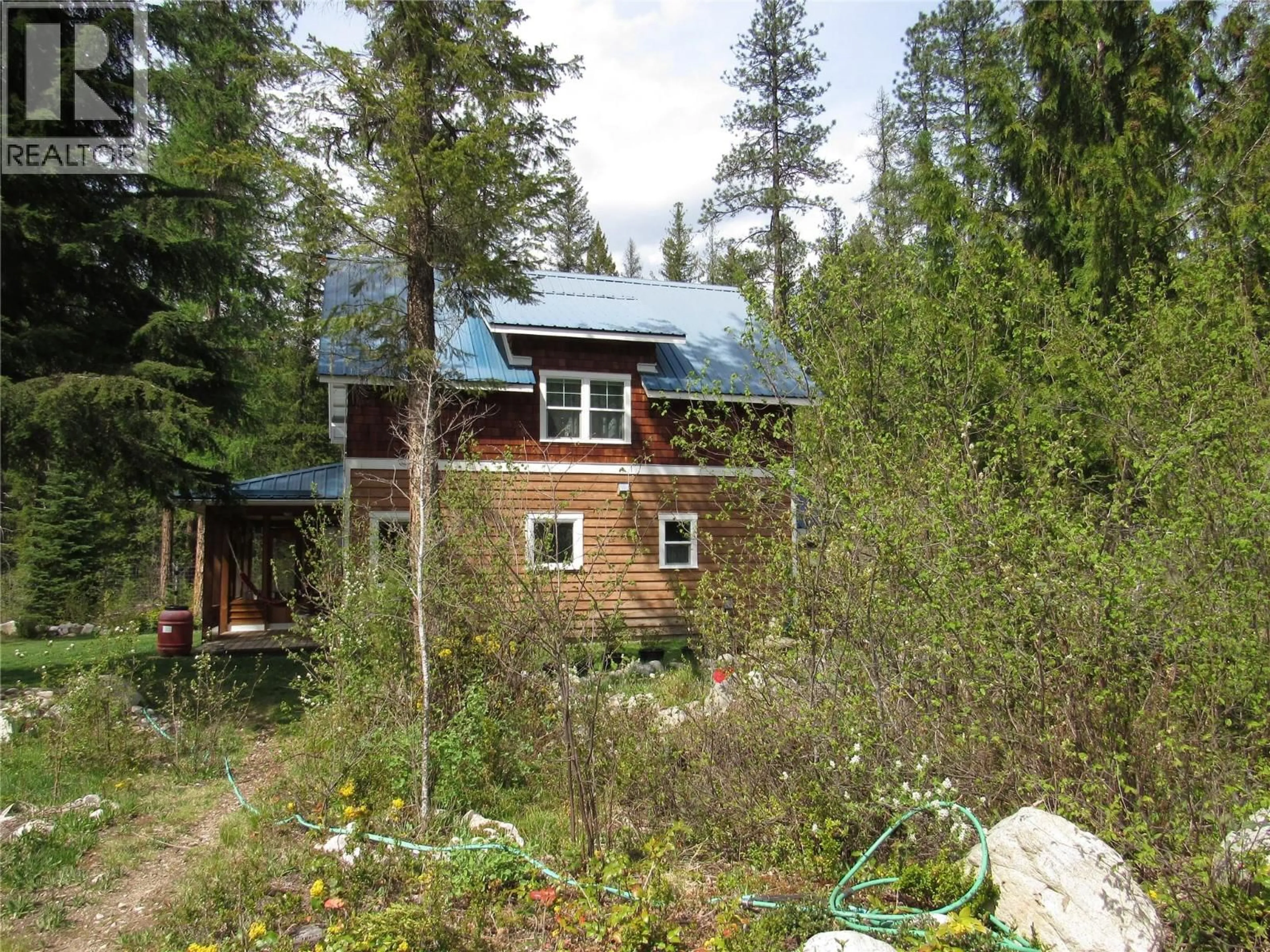 A pic from outside/outdoor area/front of a property/back of a property/a pic from drone, forest/trees view for 5538 DUCKSWAY ROAD, Winlaw British Columbia V0G2J0