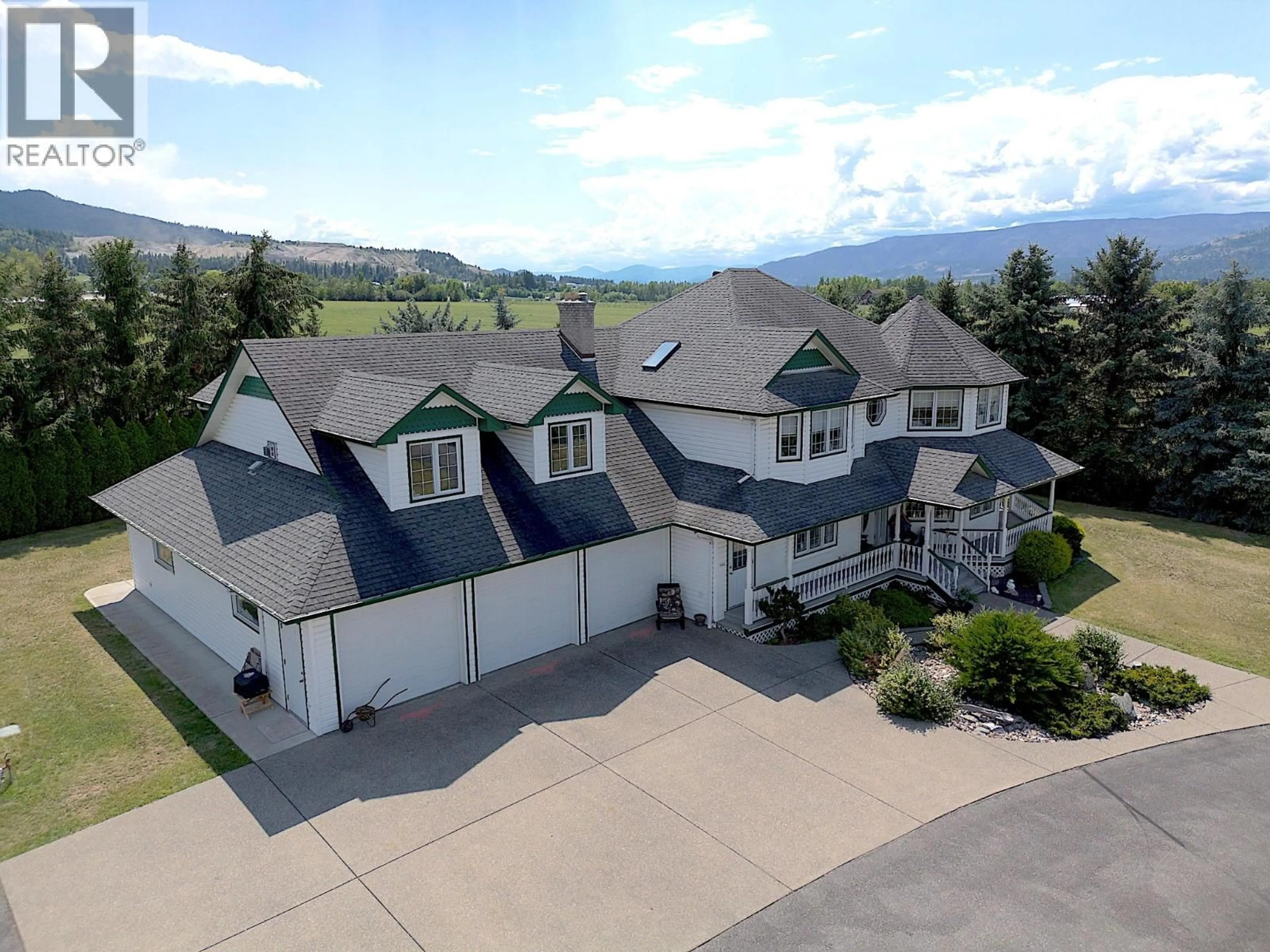A pic from outside/outdoor area/front of a property/back of a property/a pic from drone, mountain view for 135 PLEASANT VALLEY CROSS ROAD, Armstrong British Columbia V4Y0W1