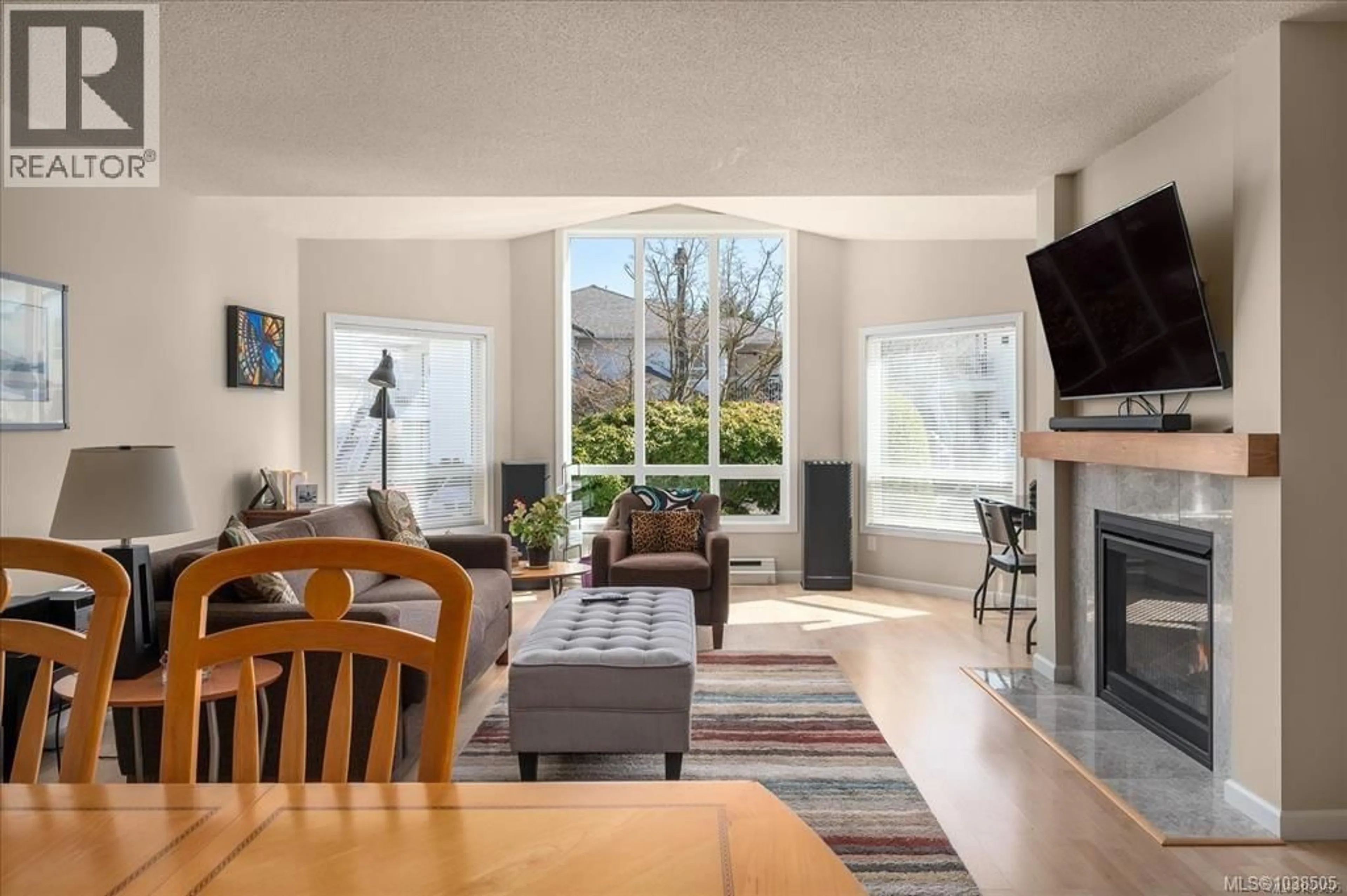 Living room with furniture, ceramic/tile floor for 17 - 6245 BLUEBACK ROAD, Nanaimo British Columbia V9V1N7