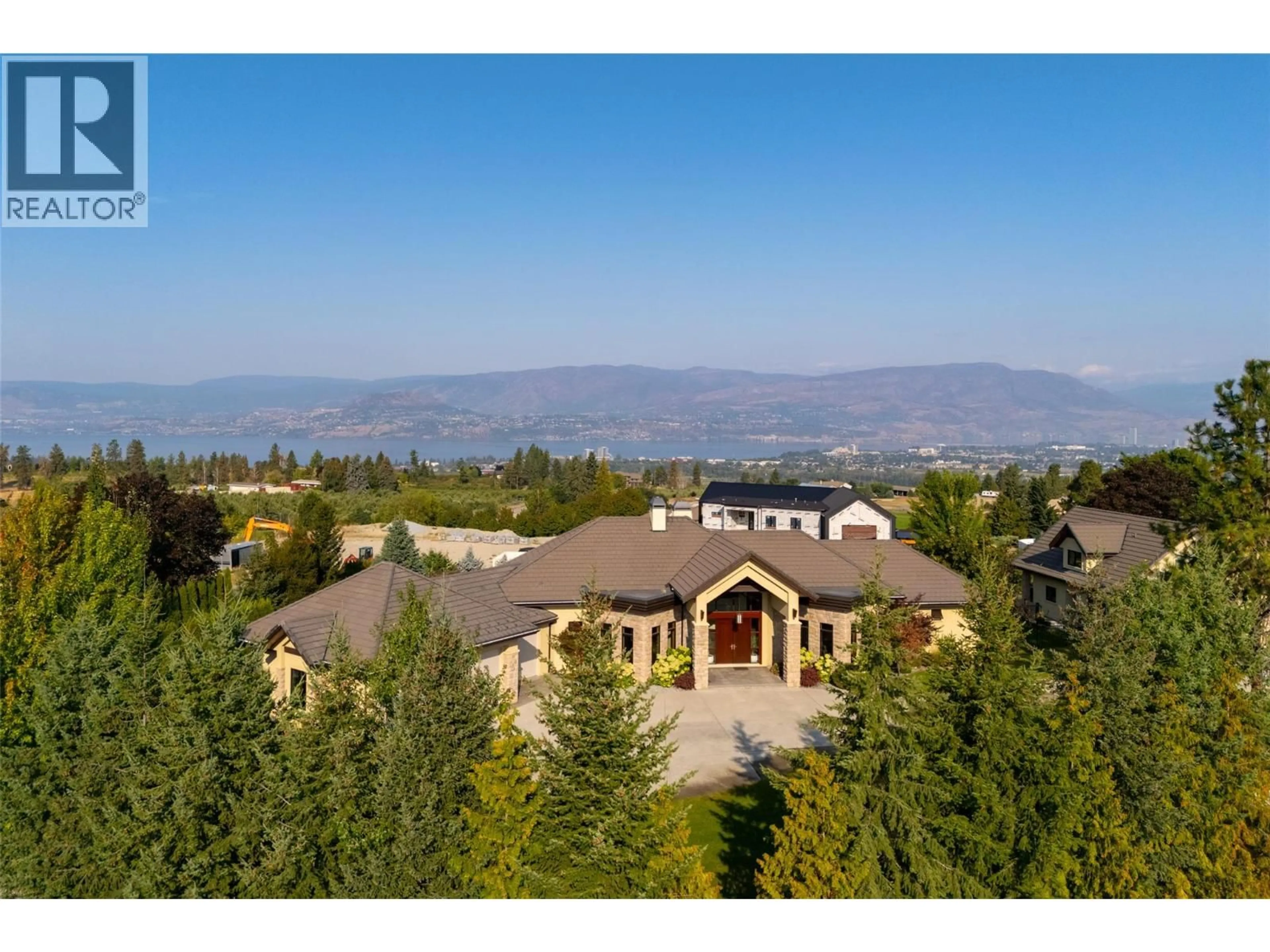 A pic from outside/outdoor area/front of a property/back of a property/a pic from drone, mountain view for 4326- 4330 BEDFORD LANE, Kelowna British Columbia V1W3C5