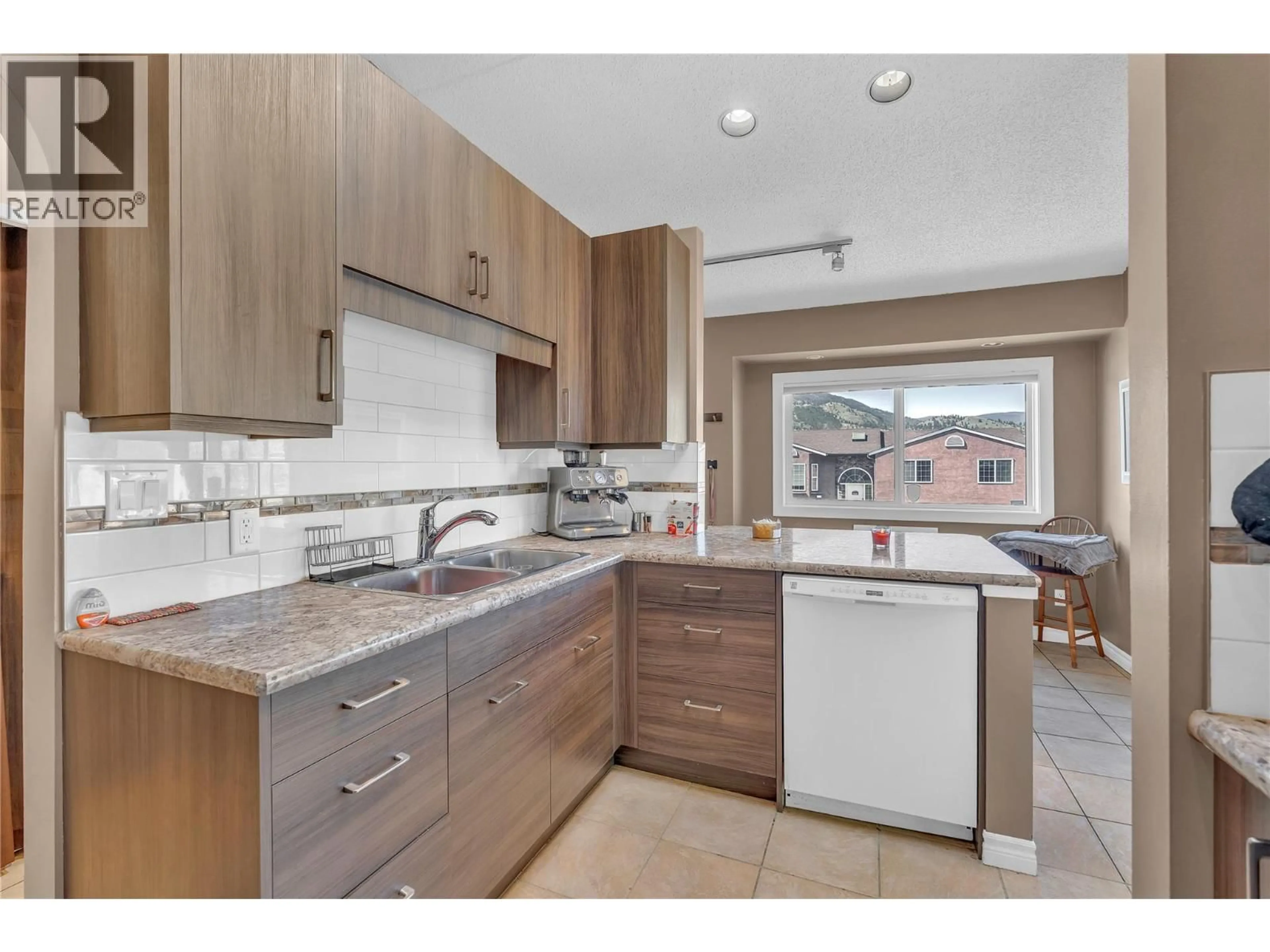 Open concept kitchen, ceramic/tile floor for 196 TROY COURT, Penticton British Columbia V2A7L4