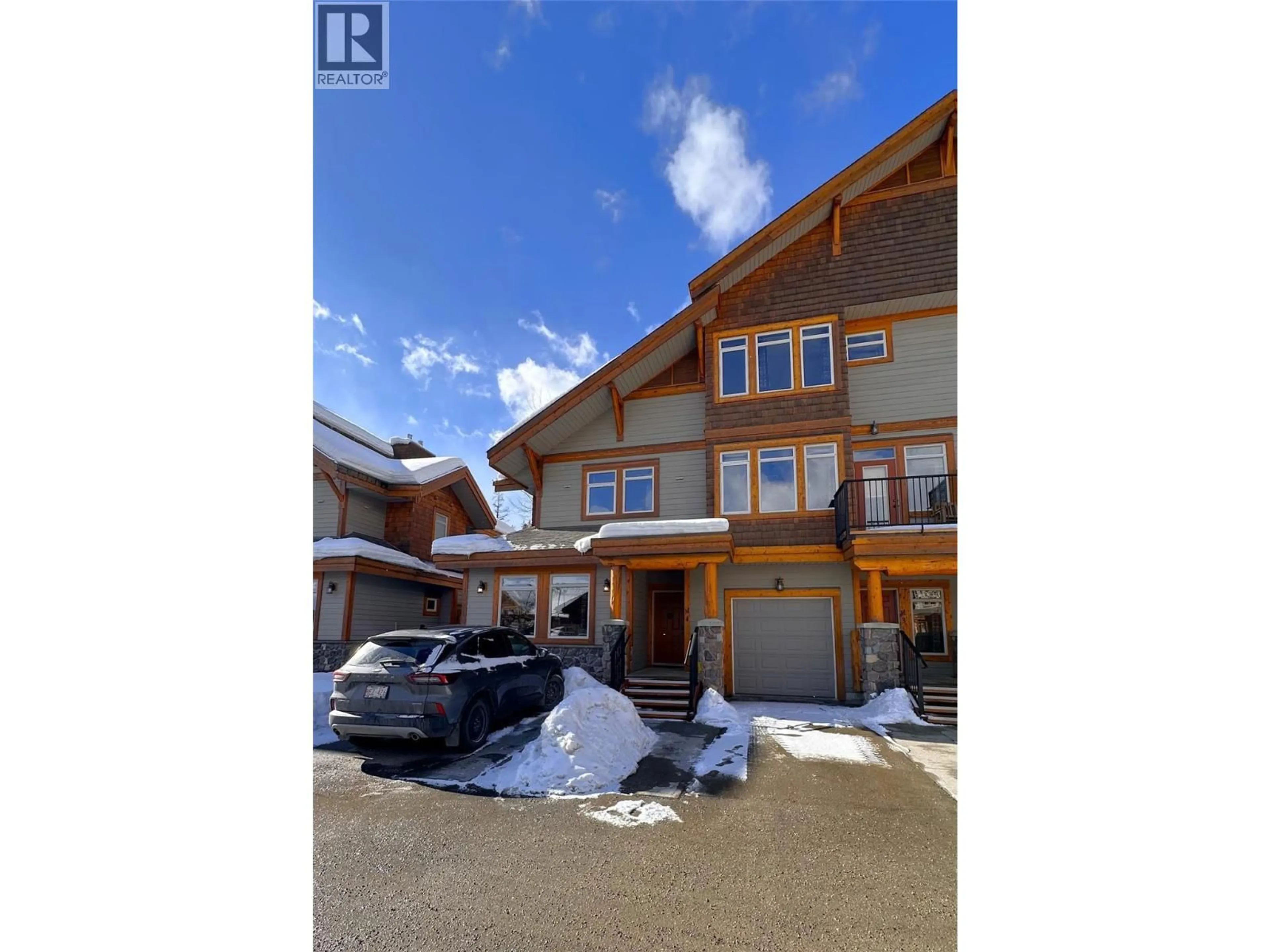 A pic from outside/outdoor area/front of a property/back of a property/a pic from drone, street for M4-D - 1351 GERRY SORENSEN WAY, Kimberley British Columbia V1A2Y6