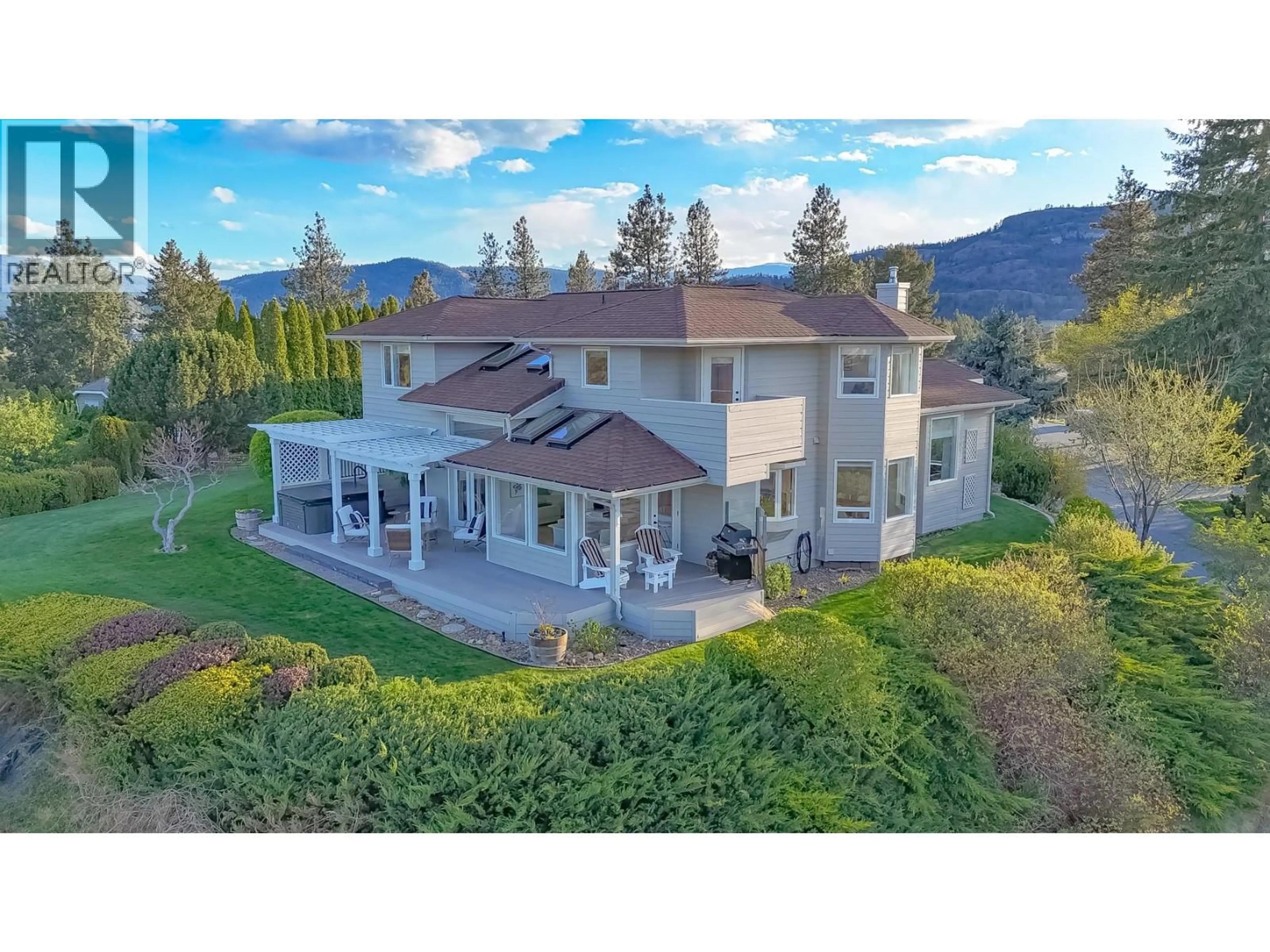 A pic from outside/outdoor area/front of a property/back of a property/a pic from drone, mountain view for 118 SUMAC RIDGE DRIVE, Summerland British Columbia V0H1Z6