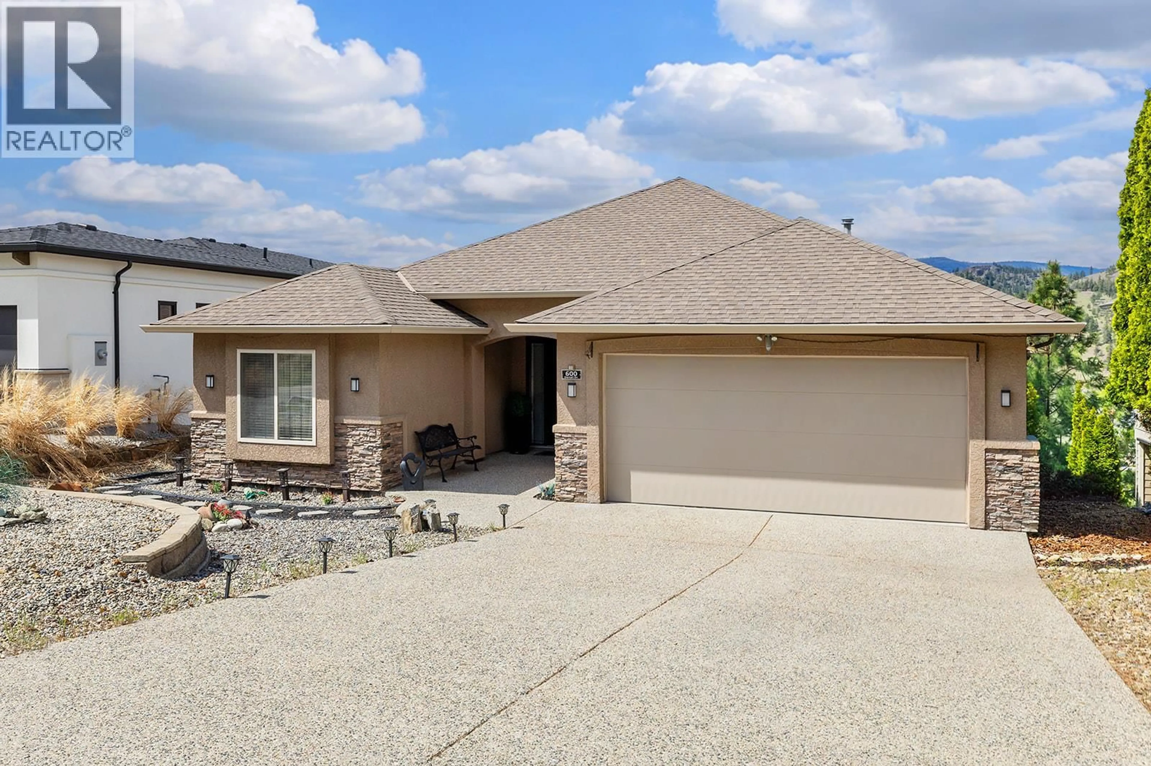 Home with brick exterior material, street for 600 DENALI DRIVE, Kelowna British Columbia V1V2P6