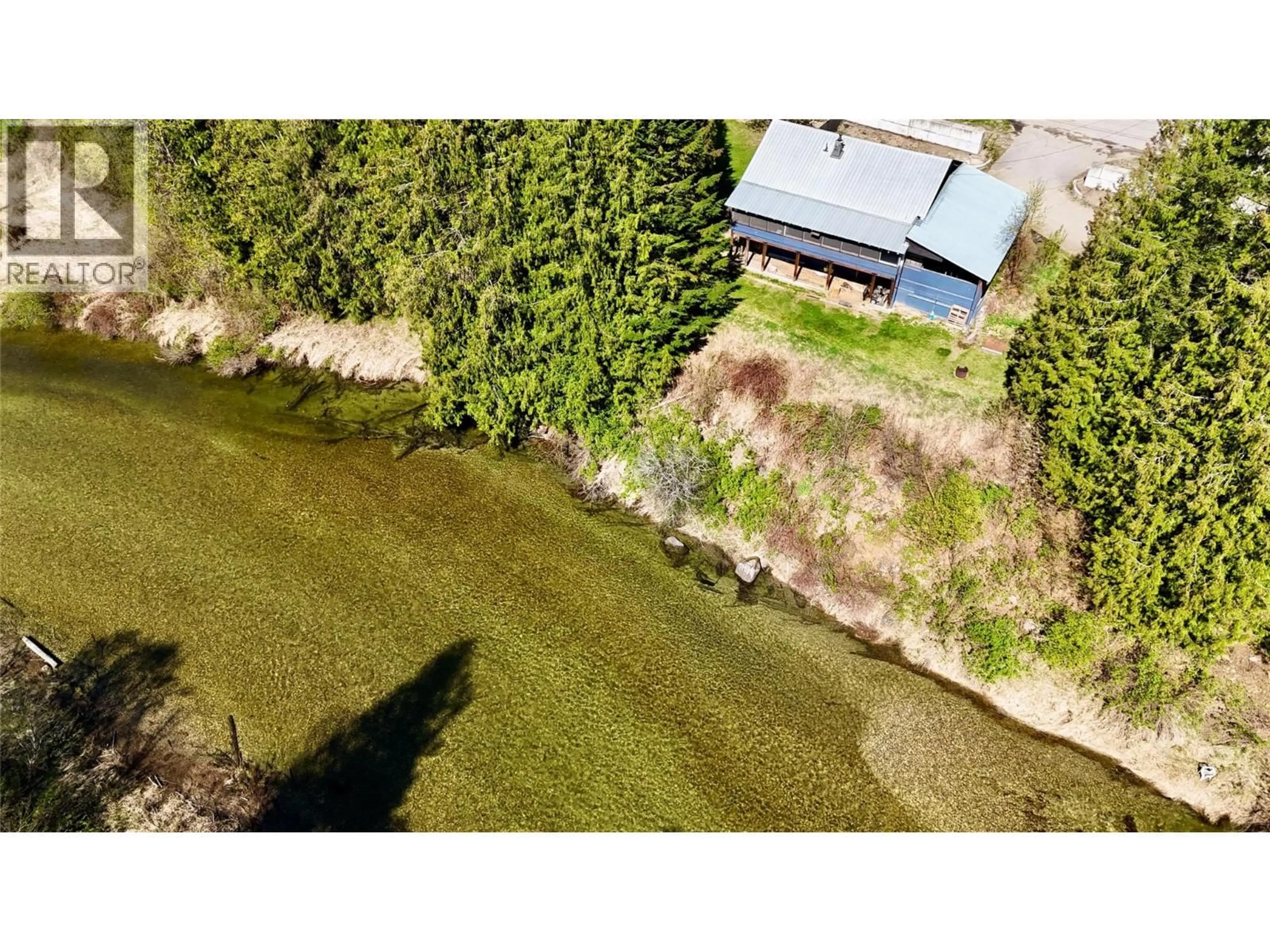 A pic from outside/outdoor area/front of a property/back of a property/a pic from drone, water/lake/river/ocean view for 5704 TRANS CANADA HIGHWAY, Malakwa British Columbia V0E2J0