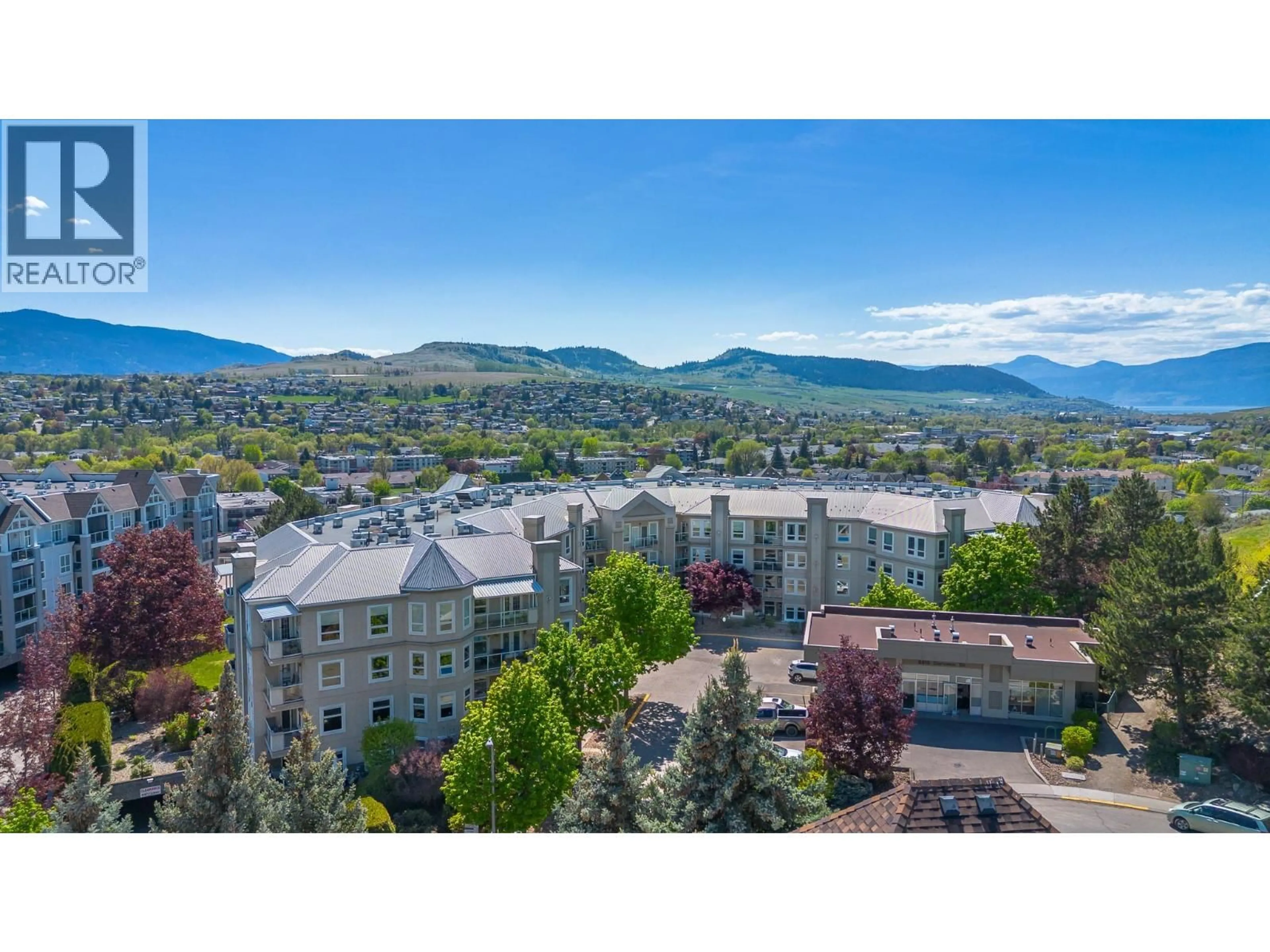 A pic from outside/outdoor area/front of a property/back of a property/a pic from drone, mountain view for 204 - 3300 CENTENNIAL DRIVE, Vernon British Columbia V1T9M5