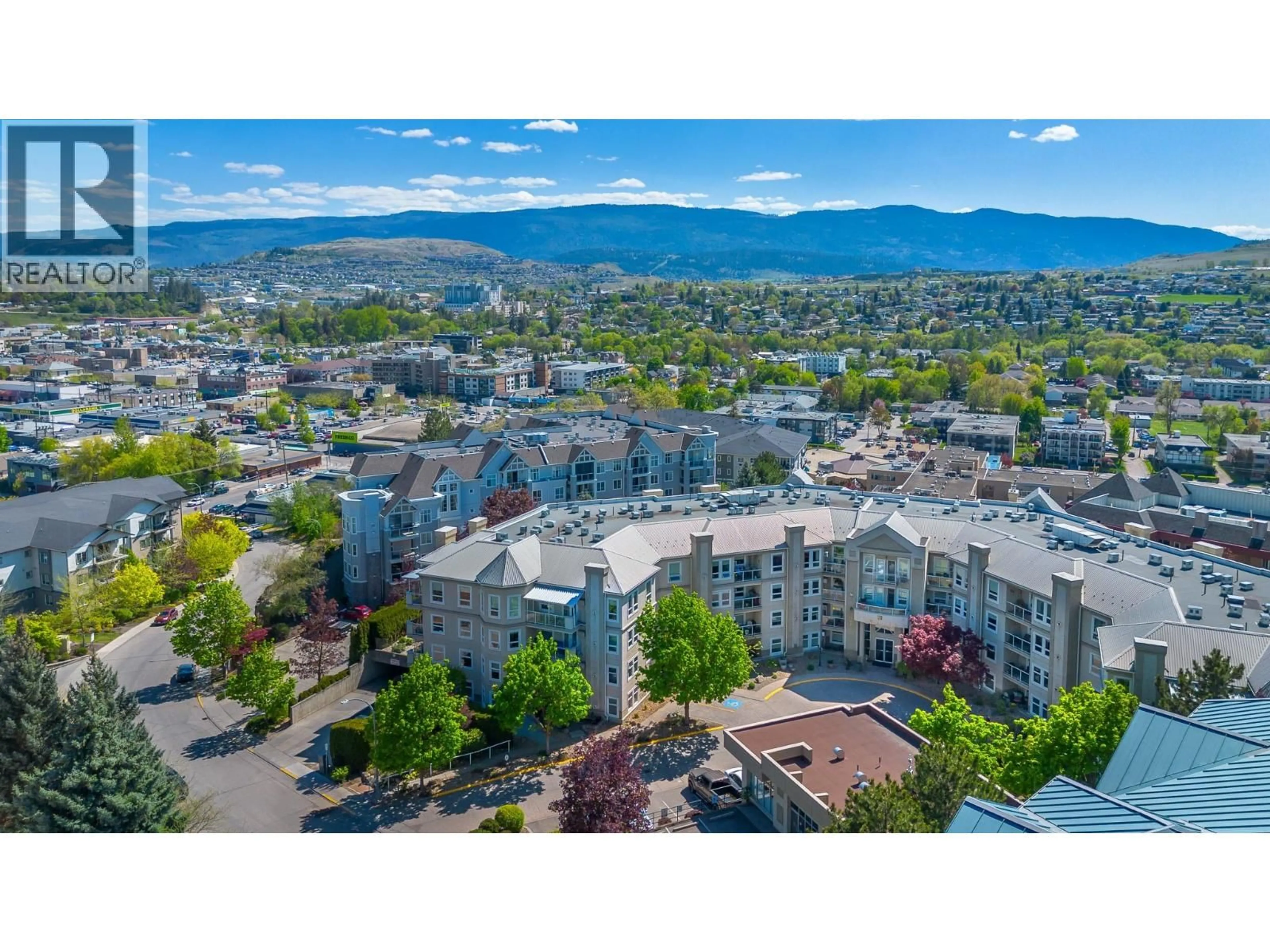 A pic from outside/outdoor area/front of a property/back of a property/a pic from drone, mountain view for 204 - 3300 CENTENNIAL DRIVE, Vernon British Columbia V1T9M5