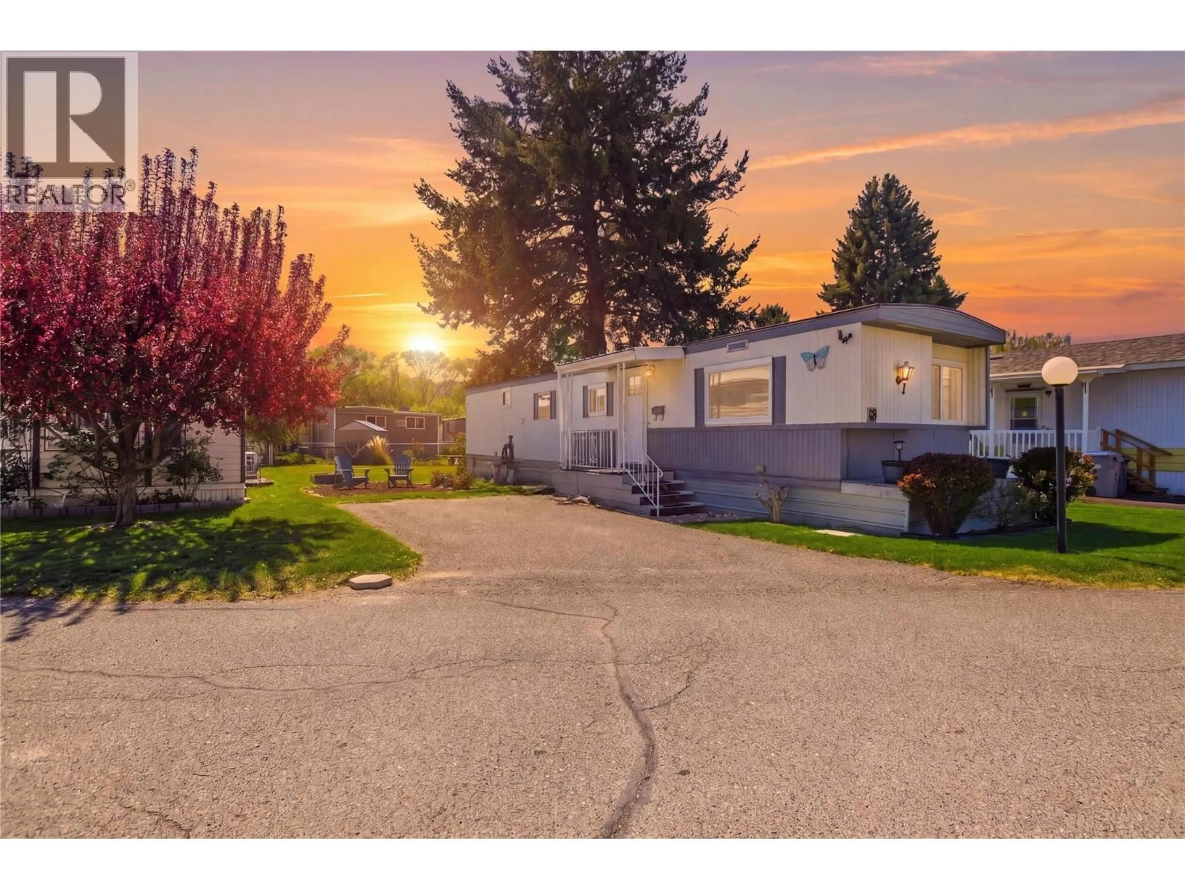 A pic from outside/outdoor area/front of a property/back of a property/a pic from drone, street for 49 - 2401 ORD ROAD, Kamloops British Columbia V2C7V8