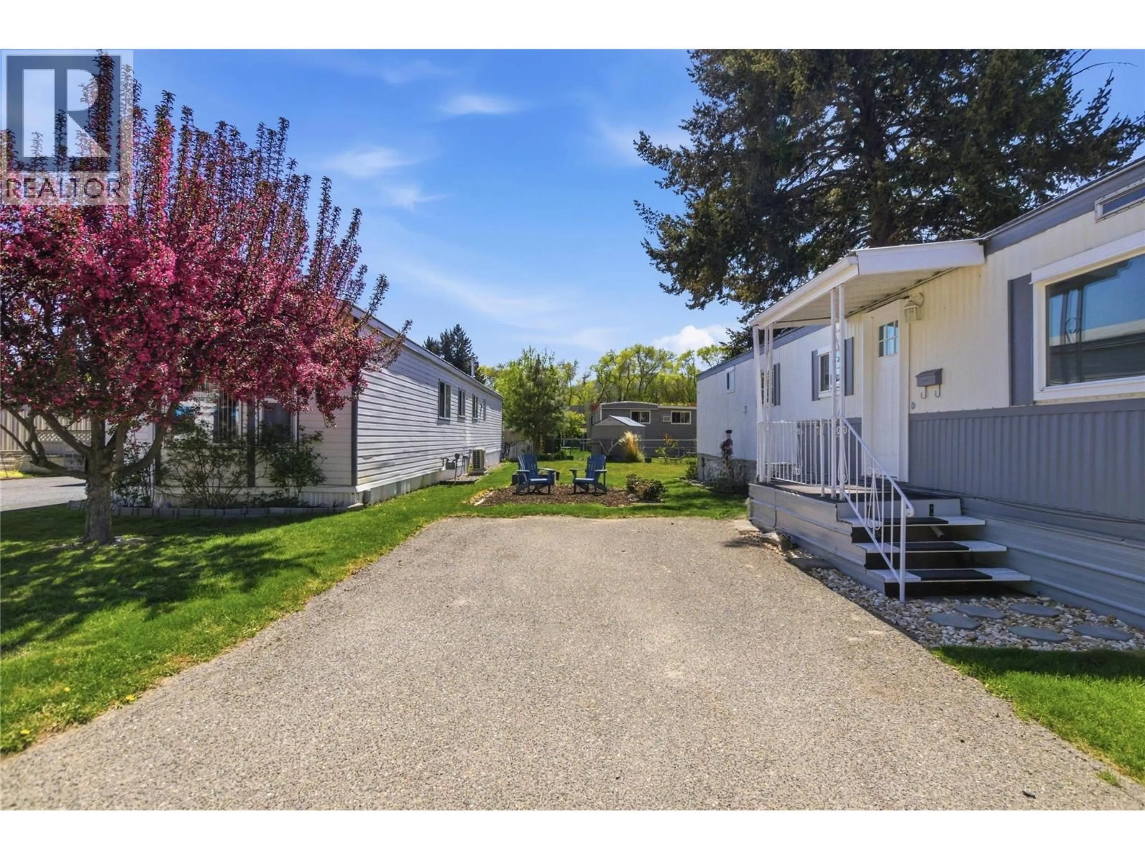 A pic from outside/outdoor area/front of a property/back of a property/a pic from drone, street for 49 - 2401 ORD ROAD, Kamloops British Columbia V2C7V8