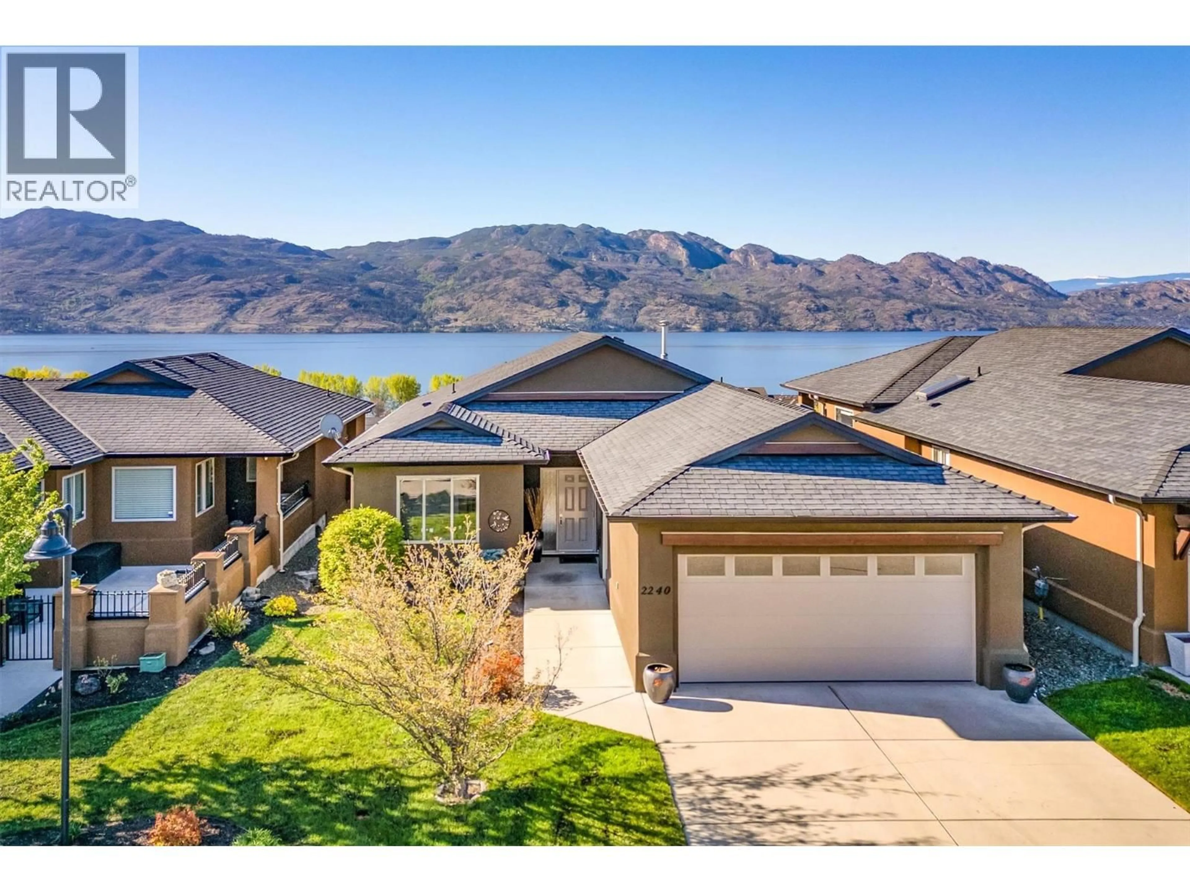 A pic from outside/outdoor area/front of a property/back of a property/a pic from drone, water/lake/river/ocean view for 2240 TERRERO PLACE, Westbank British Columbia V4T3B7