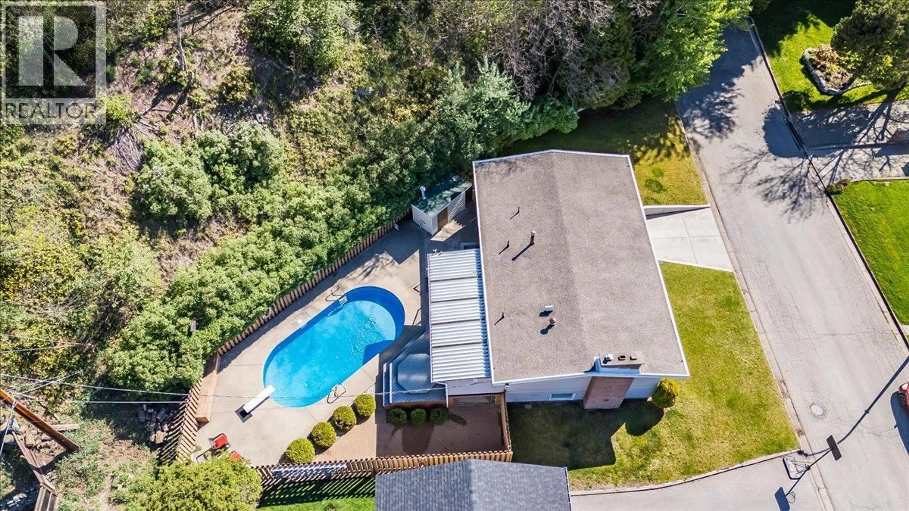 A pic from outside/outdoor area/front of a property/back of a property/a pic from drone, unknown for 541 PORTIA CRESCENT, Trail British Columbia V1R1A8