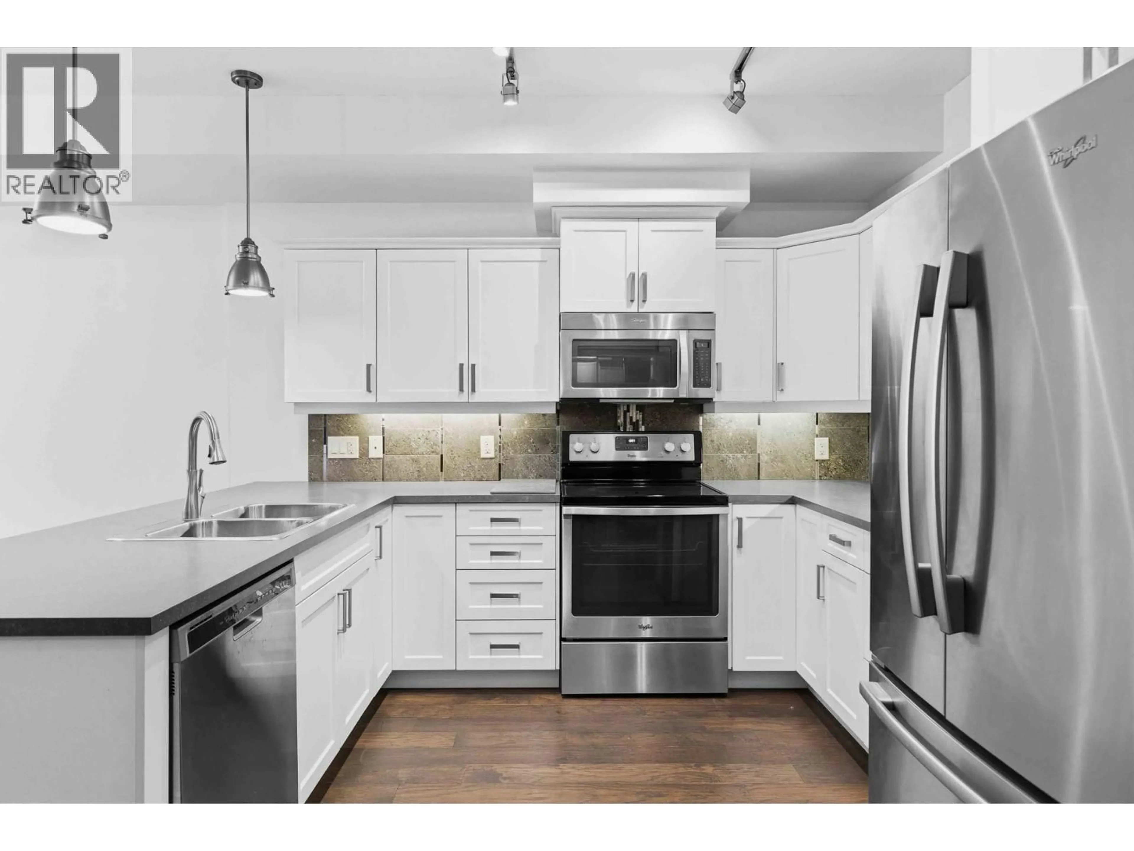 Open concept kitchen, unknown for 103 - 3733 CASORSO ROAD, Kelowna British Columbia V1W5E3
