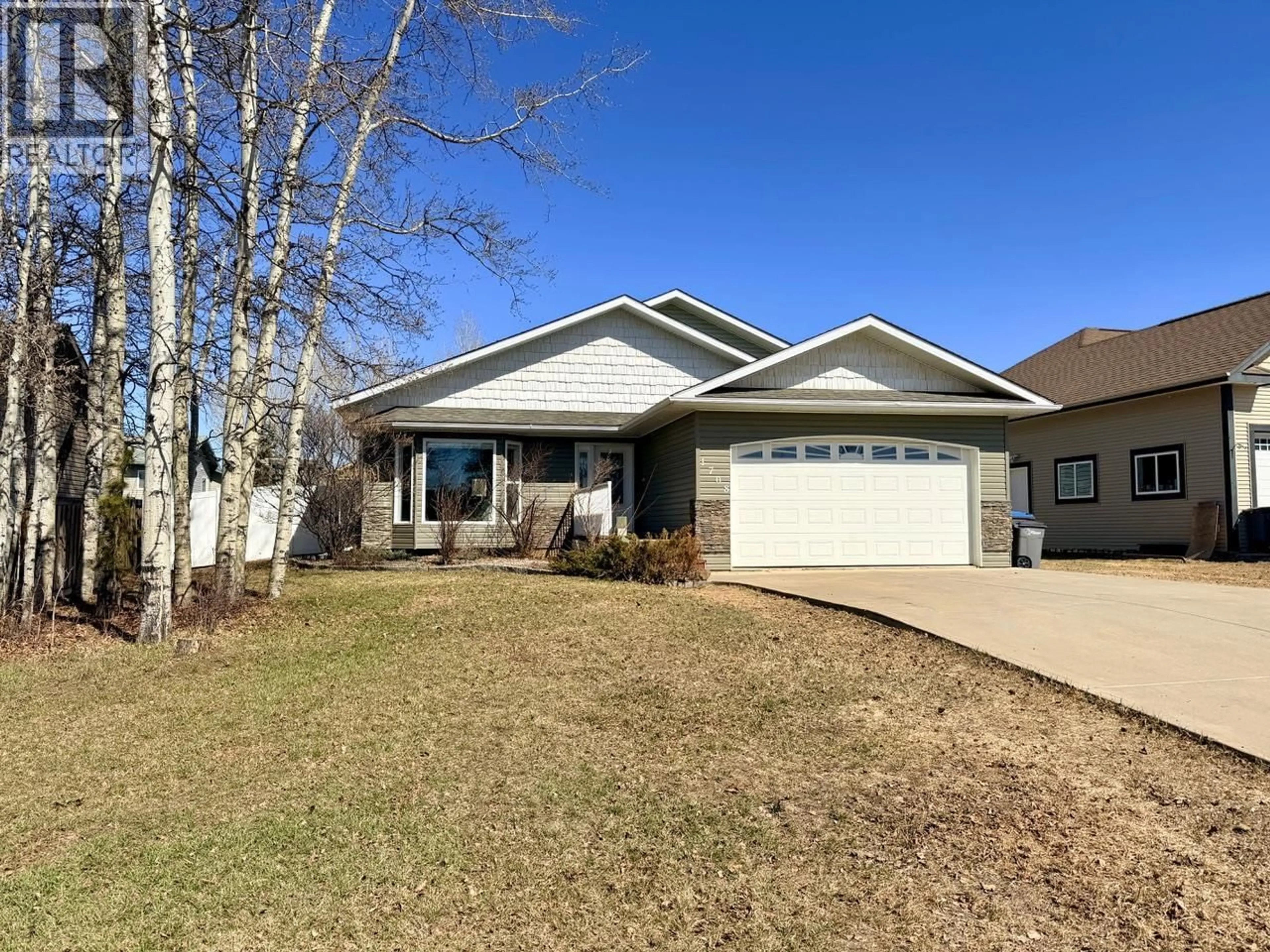 Home with vinyl exterior material, street for 1708 89 AVENUE, Dawson Creek British Columbia V1G5A7